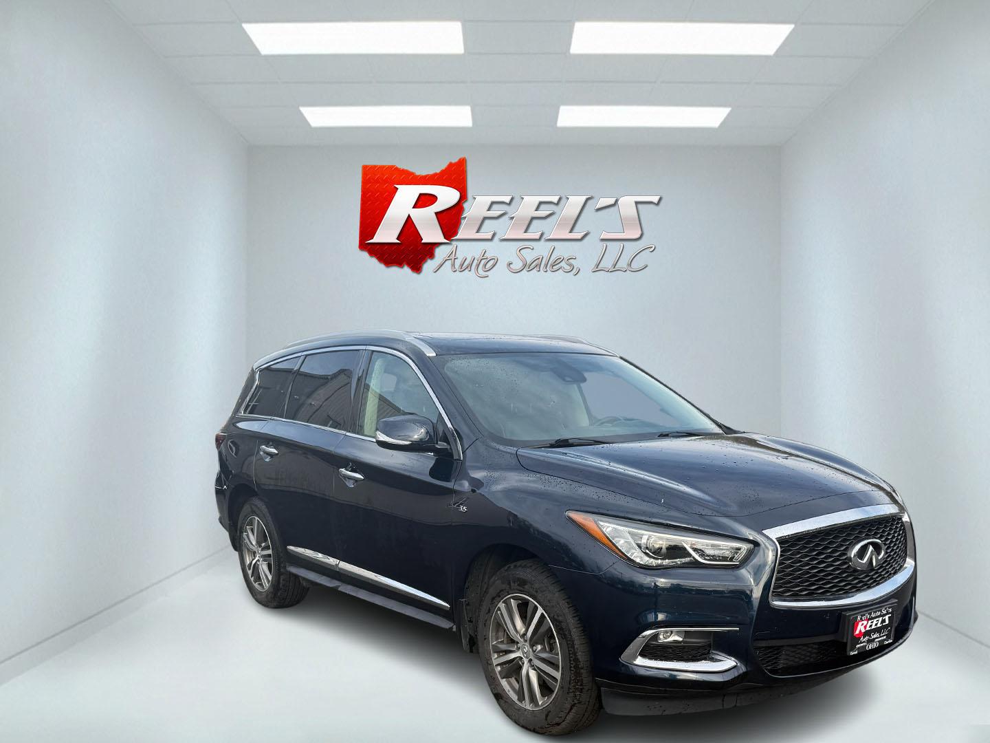 2020 Blue /Black Infiniti QX60 Luxe AWD (5N1DL0MM8LC) with an 3.5L V6 DOHC 24V engine, Automatic transmission, located at 11115 Chardon Rd. , Chardon, OH, 44024, (440) 214-9705, 41.580246, -81.241943 - This 2020 Infiniti QX60 Luxe AWD is a sophisticated SUV powered by a 3.5L V6 engine, providing a towing capacity of up to 5,000 pounds. It boasts a refined leather interior with power and heated front seats for added comfort, complemented by LED headlights and a power sunroof for an elevated driving - Photo#2