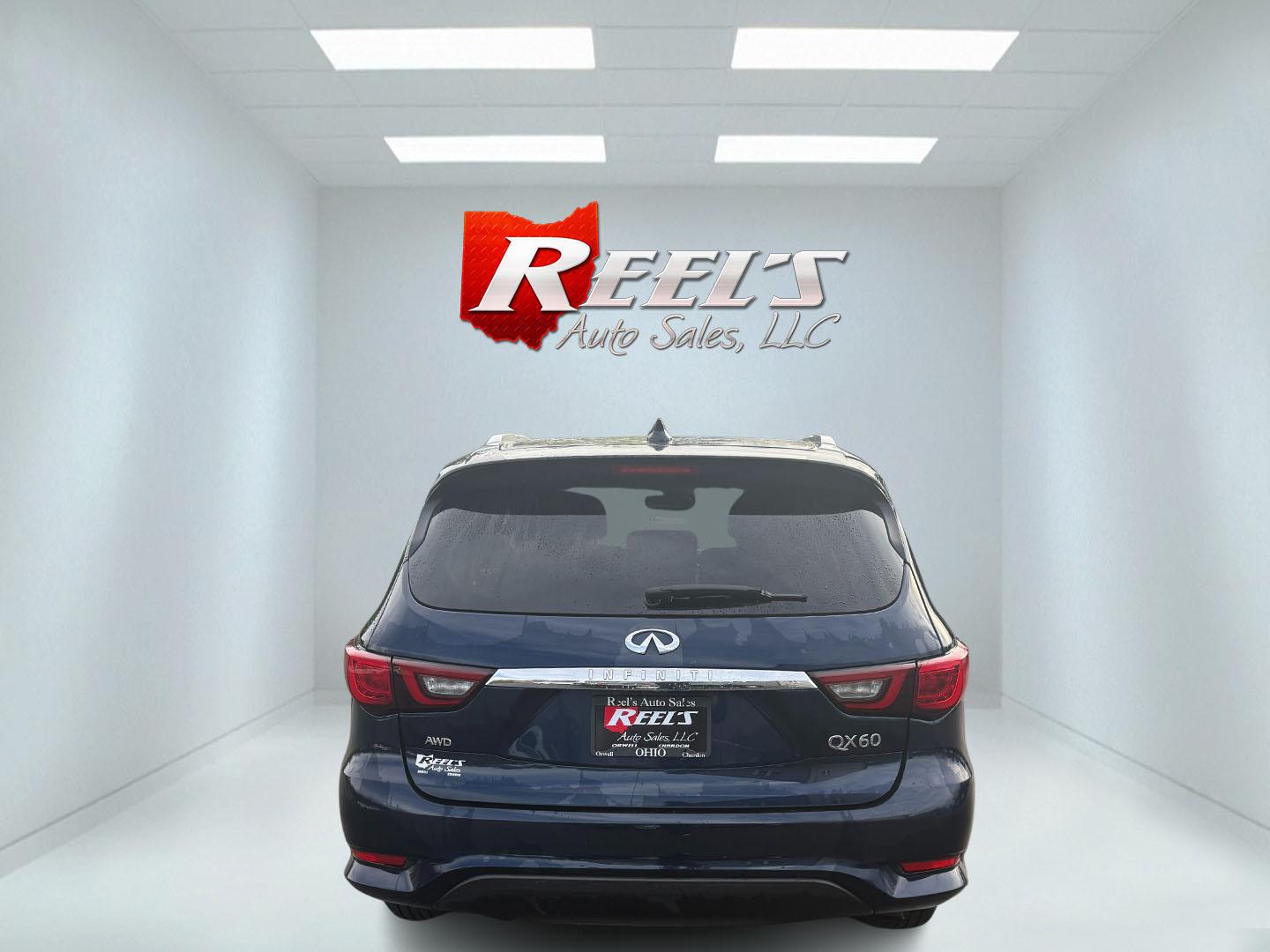 2020 Blue /Black Infiniti QX60 Luxe AWD (5N1DL0MM8LC) with an 3.5L V6 DOHC 24V engine, Automatic transmission, located at 11115 Chardon Rd. , Chardon, OH, 44024, (440) 214-9705, 41.580246, -81.241943 - This 2020 Infiniti QX60 Luxe AWD is a sophisticated SUV powered by a 3.5L V6 engine, providing a towing capacity of up to 5,000 pounds. It boasts a refined leather interior with power and heated front seats for added comfort, complemented by LED headlights and a power sunroof for an elevated driving - Photo#45