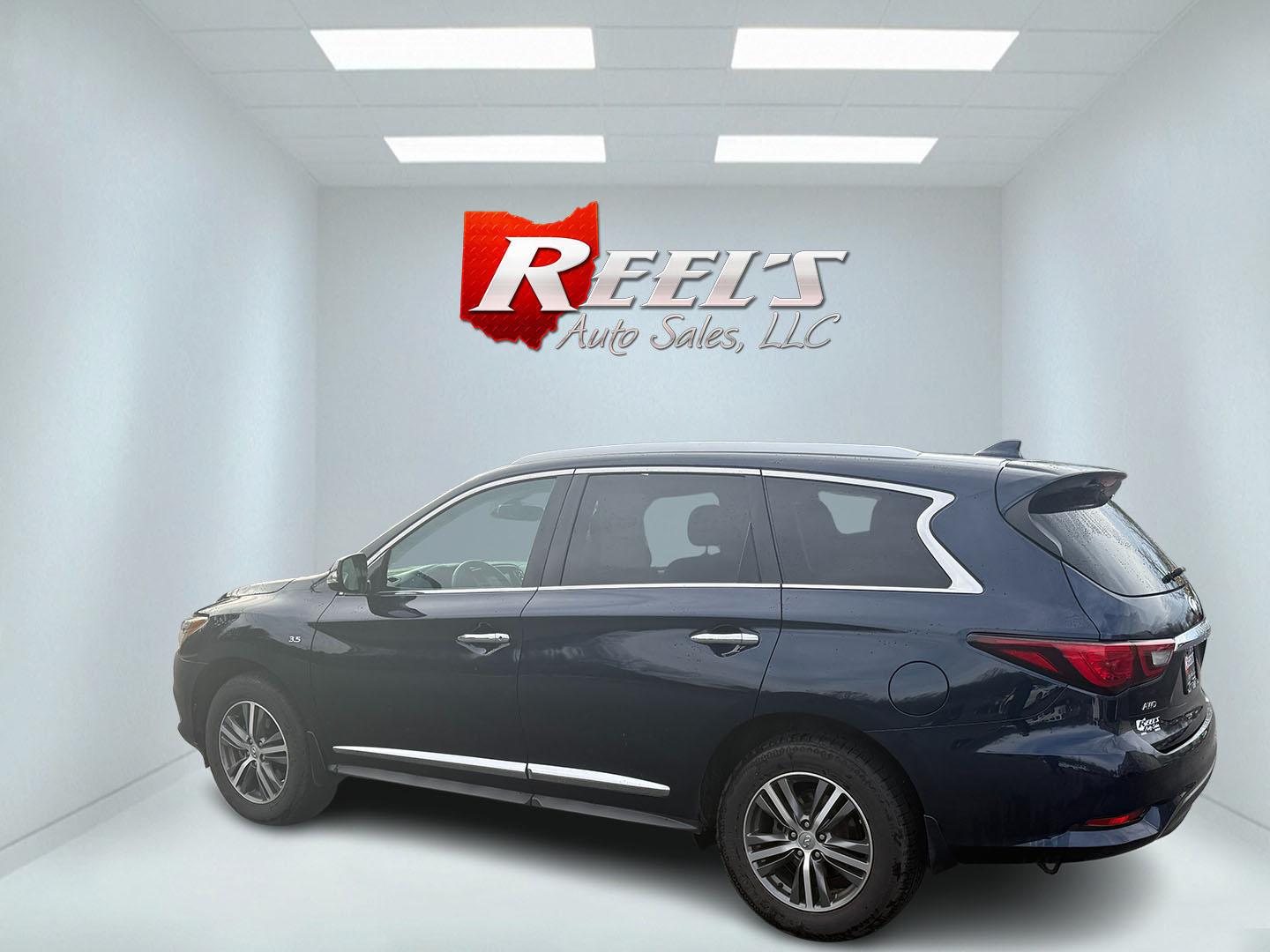 2020 Blue /Black Infiniti QX60 Luxe AWD (5N1DL0MM8LC) with an 3.5L V6 DOHC 24V engine, Automatic transmission, located at 11115 Chardon Rd. , Chardon, OH, 44024, (440) 214-9705, 41.580246, -81.241943 - This 2020 Infiniti QX60 Luxe AWD is a sophisticated SUV powered by a 3.5L V6 engine, providing a towing capacity of up to 5,000 pounds. It boasts a refined leather interior with power and heated front seats for added comfort, complemented by LED headlights and a power sunroof for an elevated driving - Photo#47