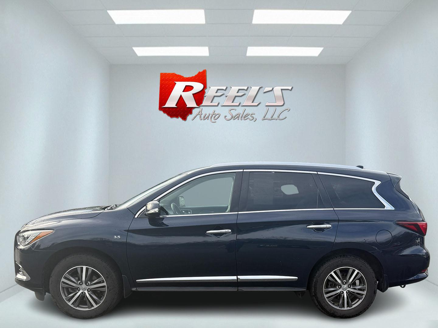 2020 Blue /Black Infiniti QX60 Luxe AWD (5N1DL0MM8LC) with an 3.5L V6 DOHC 24V engine, Automatic transmission, located at 11115 Chardon Rd. , Chardon, OH, 44024, (440) 214-9705, 41.580246, -81.241943 - This 2020 Infiniti QX60 Luxe AWD is a sophisticated SUV powered by a 3.5L V6 engine, providing a towing capacity of up to 5,000 pounds. It boasts a refined leather interior with power and heated front seats for added comfort, complemented by LED headlights and a power sunroof for an elevated driving - Photo#48