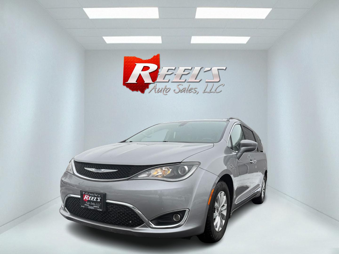 2017 Silver /White Chrysler Pacifica Touring-L (2C4RC1BG3HR) with an 3.6L V6 DOHC 24V engine, 9 Speed Automatic transmission, located at 11115 Chardon Rd. , Chardon, OH, 44024, (440) 214-9705, 41.580246, -81.241943 - Photo#0