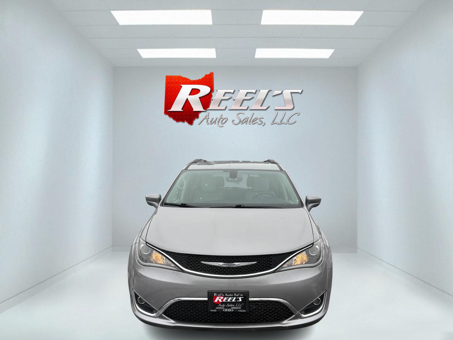 2017 Silver /White Chrysler Pacifica Touring-L (2C4RC1BG3HR) with an 3.6L V6 DOHC 24V engine, 9 Speed Automatic transmission, located at 11115 Chardon Rd. , Chardon, OH, 44024, (440) 214-9705, 41.580246, -81.241943 - Photo#1