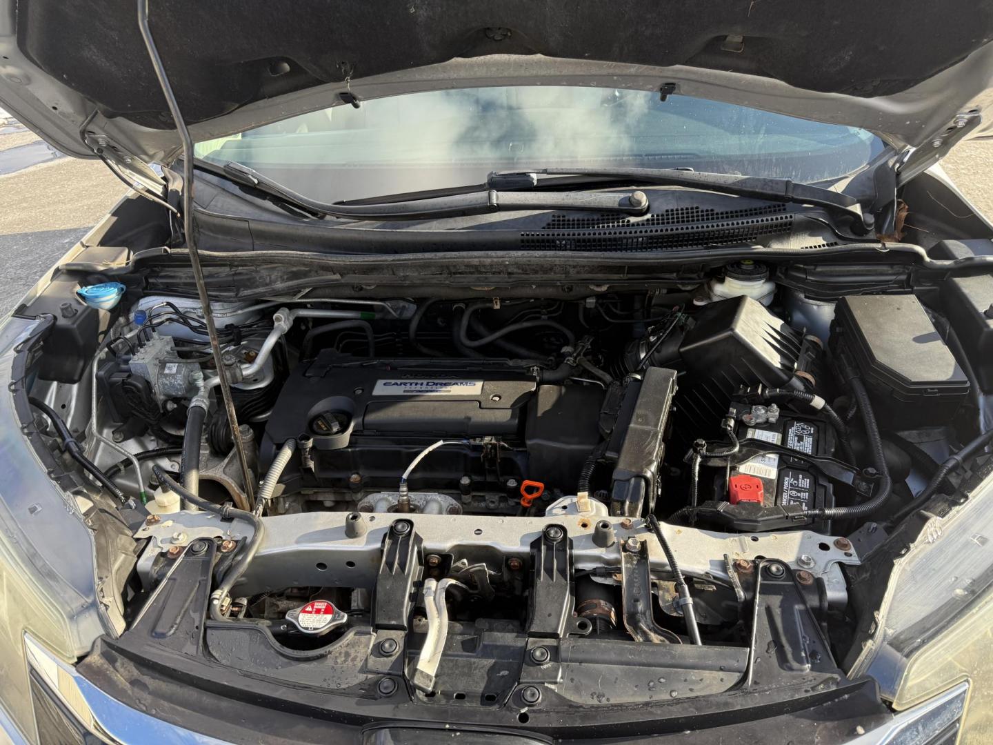 2015 Silver /Gray Honda CR-V LX 4WD (5J6RM4H39FL) with an 2.4L I4 DOHC 16V engine, Automatic transmission, located at 547 E. Main St., Orwell, OH, 44076, (440) 437-5893, 41.535435, -80.847855 - Photo#14