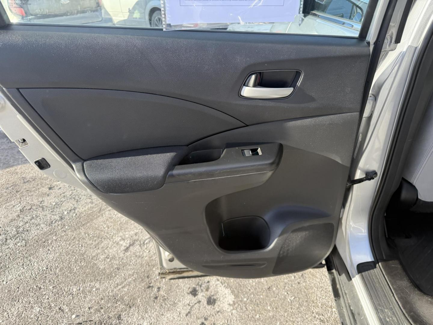 2015 Silver /Gray Honda CR-V LX 4WD (5J6RM4H39FL) with an 2.4L I4 DOHC 16V engine, Automatic transmission, located at 547 E. Main St., Orwell, OH, 44076, (440) 437-5893, 41.535435, -80.847855 - Photo#30