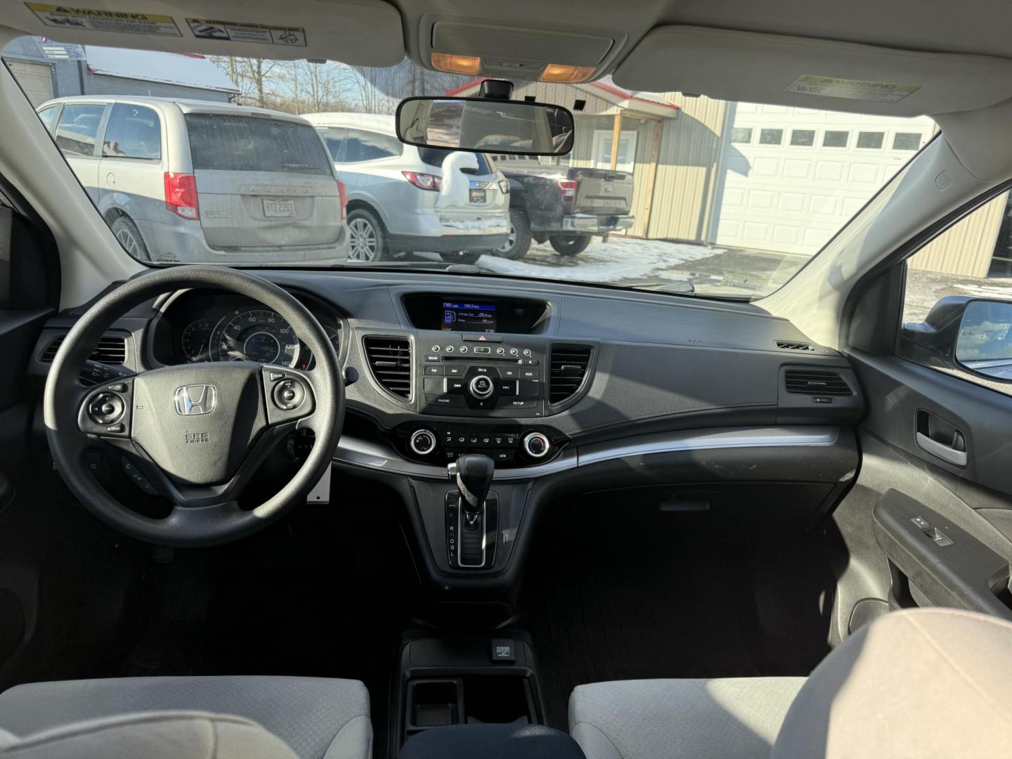 2015 Silver /Gray Honda CR-V LX 4WD (5J6RM4H39FL) with an 2.4L I4 DOHC 16V engine, Automatic transmission, located at 547 E. Main St., Orwell, OH, 44076, (440) 437-5893, 41.535435, -80.847855 - Photo#32