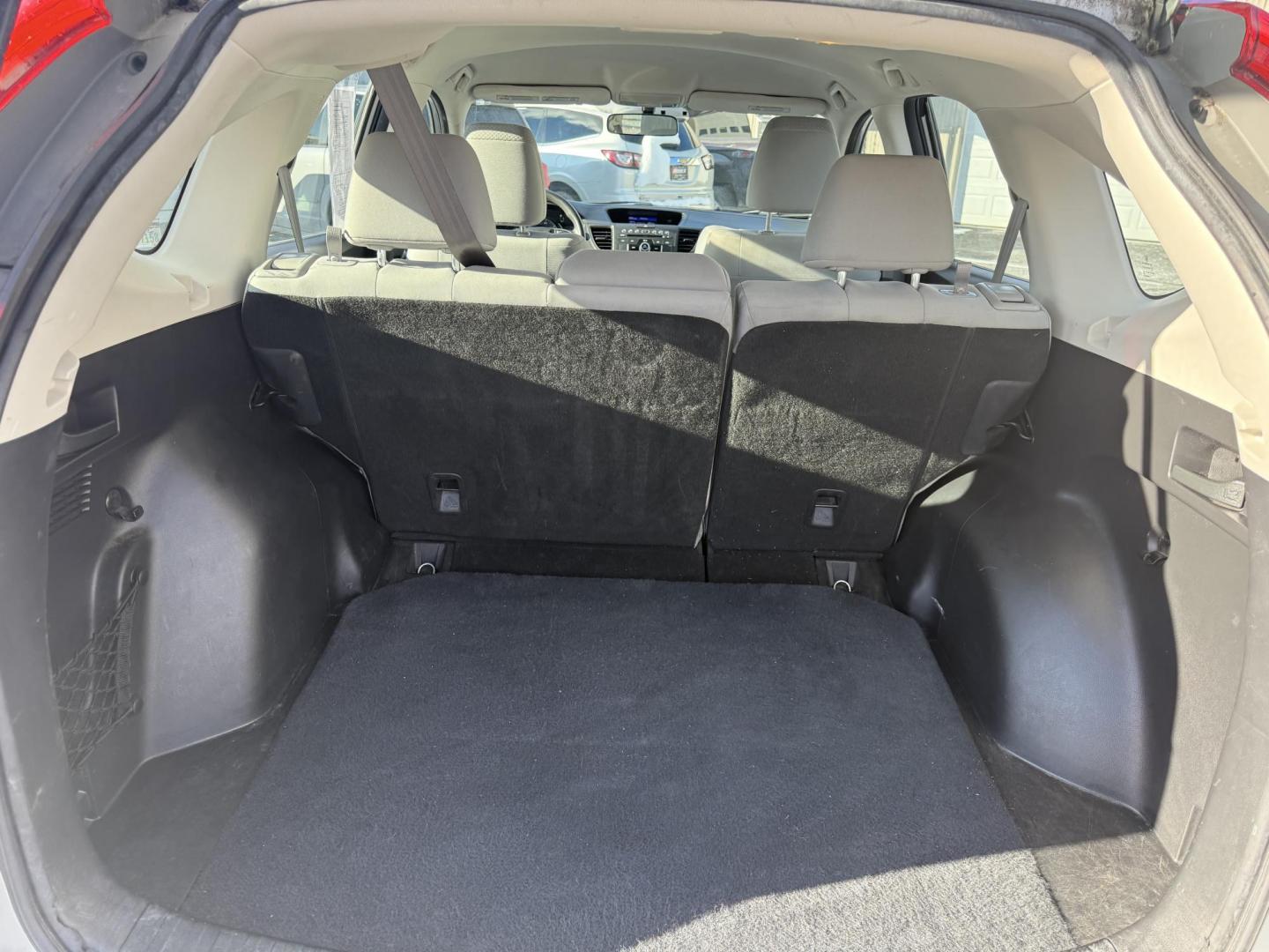 2015 Silver /Gray Honda CR-V LX 4WD (5J6RM4H39FL) with an 2.4L I4 DOHC 16V engine, Automatic transmission, located at 547 E. Main St., Orwell, OH, 44076, (440) 437-5893, 41.535435, -80.847855 - Photo#33