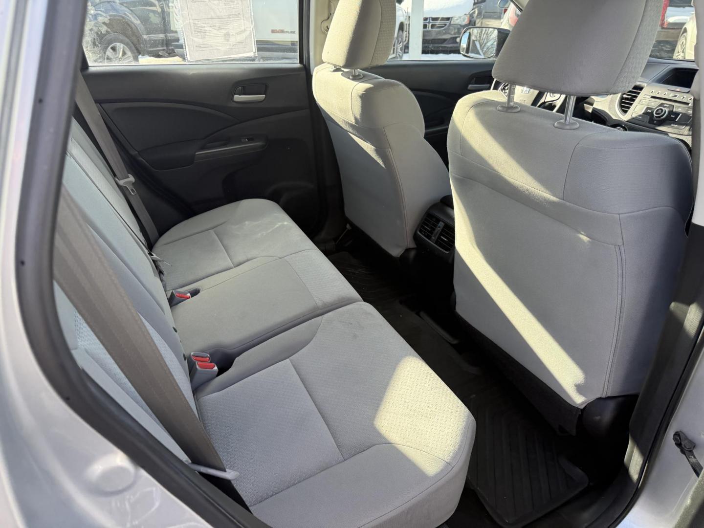 2015 Silver /Gray Honda CR-V LX 4WD (5J6RM4H39FL) with an 2.4L I4 DOHC 16V engine, Automatic transmission, located at 547 E. Main St., Orwell, OH, 44076, (440) 437-5893, 41.535435, -80.847855 - Photo#34