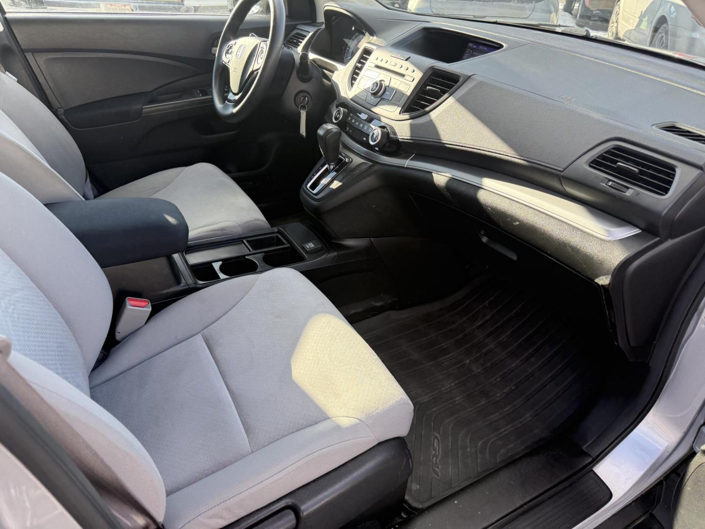 2015 Silver /Gray Honda CR-V LX 4WD (5J6RM4H39FL) with an 2.4L I4 DOHC 16V engine, Automatic transmission, located at 547 E. Main St., Orwell, OH, 44076, (440) 437-5893, 41.535435, -80.847855 - Photo#38