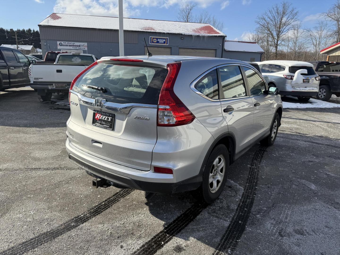 2015 Silver /Gray Honda CR-V LX 4WD (5J6RM4H39FL) with an 2.4L I4 DOHC 16V engine, Automatic transmission, located at 547 E. Main St., Orwell, OH, 44076, (440) 437-5893, 41.535435, -80.847855 - Photo#7