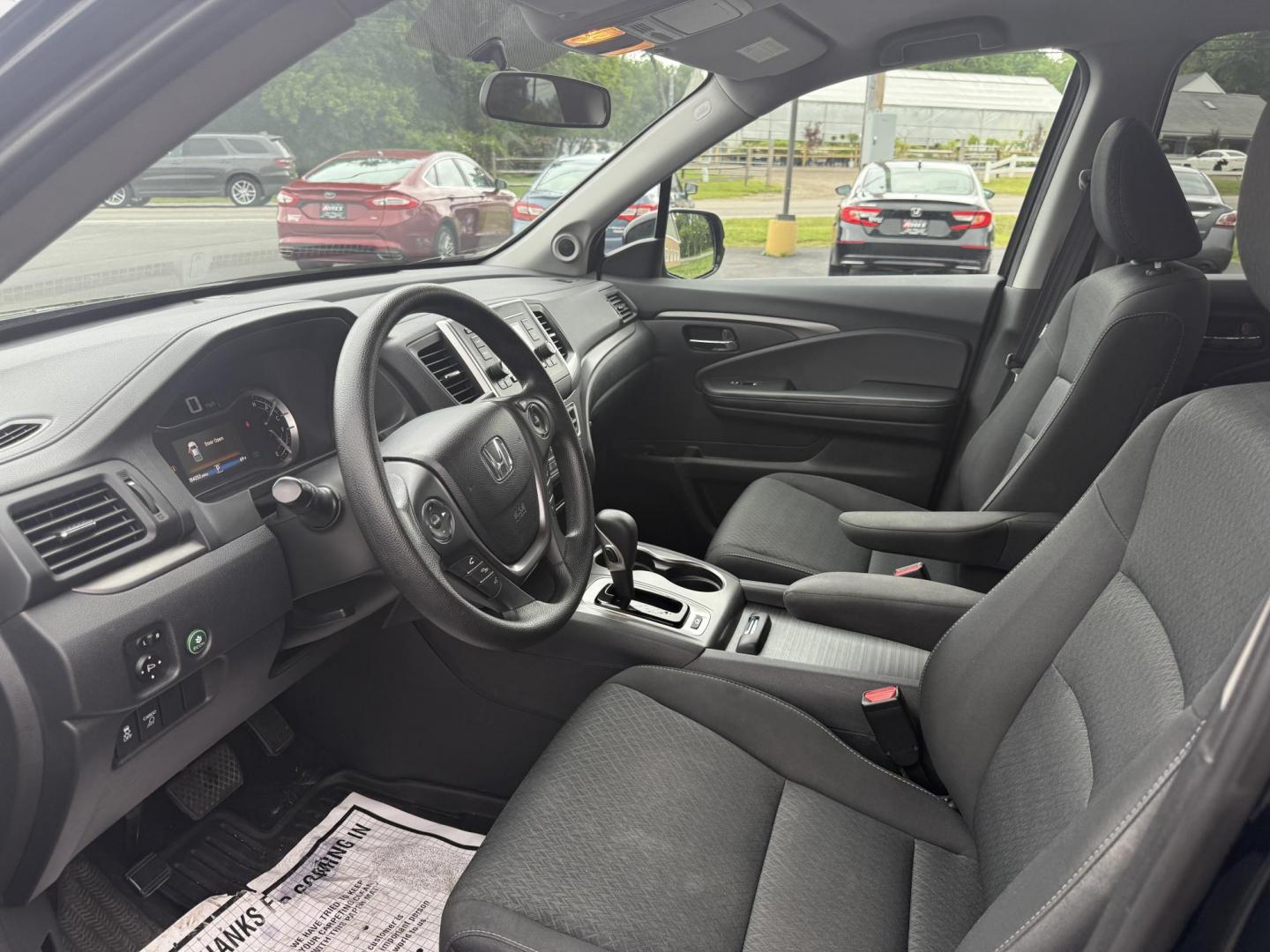 2019 Black /Black Honda Ridgeline Sport AWD (5FPYK3F10KB) with an 3.5L V6 SOHC 24V engine, 6 Speed Auto transmission, located at 11115 Chardon Rd. , Chardon, OH, 44024, (440) 214-9705, 41.580246, -81.241943 - This 2019 Honda Ridgeline Sport AWD is equipped with a 3.5-liter EarthDreams V6 engine and a 6-speed automatic transmission, offering a blend of power and efficiency. It features convenient daytime running lights and dusk-sensing headlights for enhanced visibility. Inside, this Ridgeline provides a - Photo#19