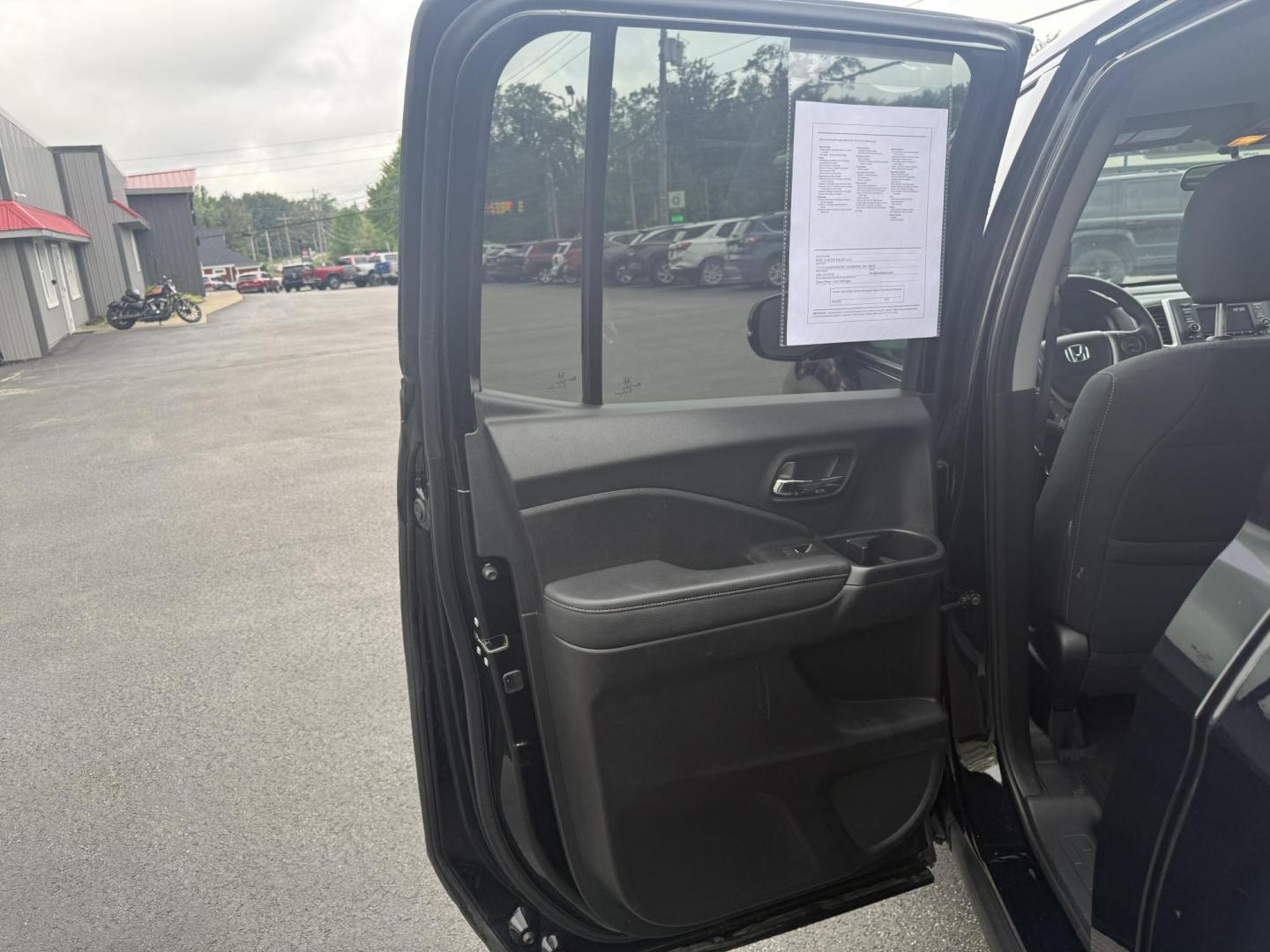 2019 Black /Black Honda Ridgeline Sport AWD (5FPYK3F10KB) with an 3.5L V6 SOHC 24V engine, 6 Speed Auto transmission, located at 11115 Chardon Rd. , Chardon, OH, 44024, (440) 214-9705, 41.580246, -81.241943 - This 2019 Honda Ridgeline Sport AWD is equipped with a 3.5-liter EarthDreams V6 engine and a 6-speed automatic transmission, offering a blend of power and efficiency. It features convenient daytime running lights and dusk-sensing headlights for enhanced visibility. Inside, this Ridgeline provides a - Photo#25