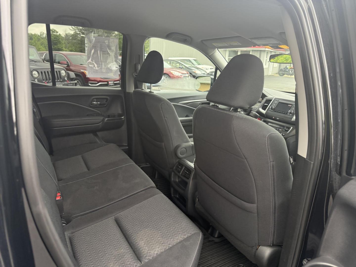 2019 Black /Black Honda Ridgeline Sport AWD (5FPYK3F10KB) with an 3.5L V6 SOHC 24V engine, 6 Speed Auto transmission, located at 11115 Chardon Rd. , Chardon, OH, 44024, (440) 214-9705, 41.580246, -81.241943 - This 2019 Honda Ridgeline Sport AWD is equipped with a 3.5-liter EarthDreams V6 engine and a 6-speed automatic transmission, offering a blend of power and efficiency. It features convenient daytime running lights and dusk-sensing headlights for enhanced visibility. Inside, this Ridgeline provides a - Photo#27