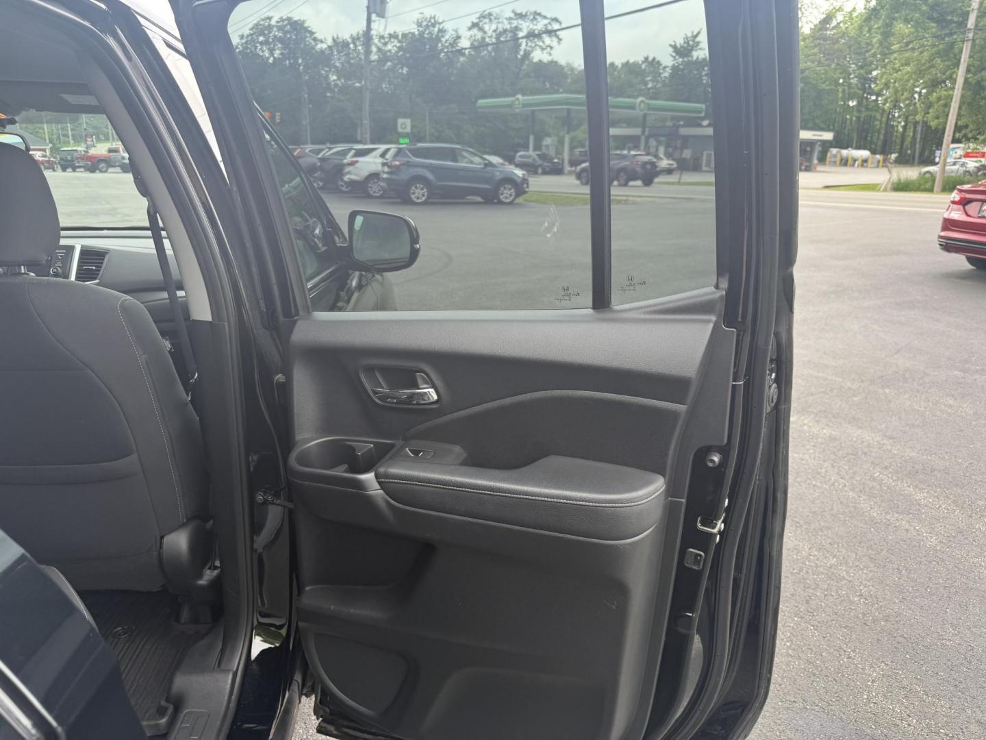 2019 Black /Black Honda Ridgeline Sport AWD (5FPYK3F10KB) with an 3.5L V6 SOHC 24V engine, 6 Speed Auto transmission, located at 11115 Chardon Rd. , Chardon, OH, 44024, (440) 214-9705, 41.580246, -81.241943 - This 2019 Honda Ridgeline Sport AWD is equipped with a 3.5-liter EarthDreams V6 engine and a 6-speed automatic transmission, offering a blend of power and efficiency. It features convenient daytime running lights and dusk-sensing headlights for enhanced visibility. Inside, this Ridgeline provides a - Photo#28