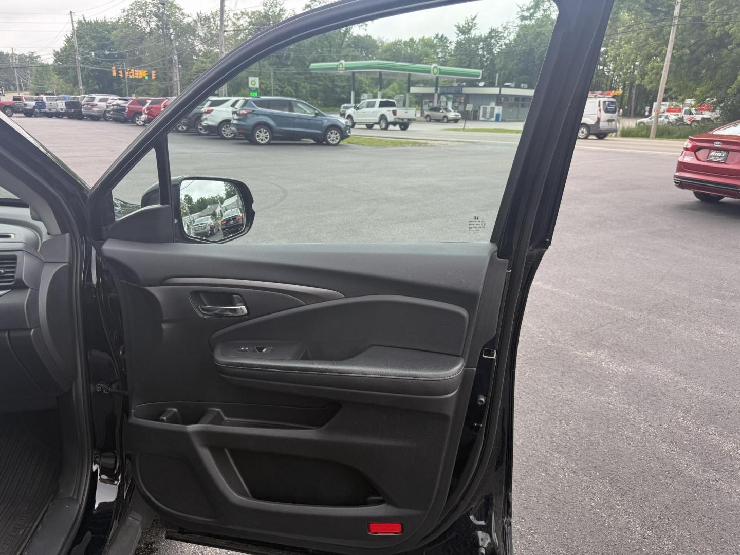 2019 Black /Black Honda Ridgeline Sport AWD (5FPYK3F10KB) with an 3.5L V6 SOHC 24V engine, 6 Speed Auto transmission, located at 11115 Chardon Rd. , Chardon, OH, 44024, (440) 214-9705, 41.580246, -81.241943 - This 2019 Honda Ridgeline Sport AWD is equipped with a 3.5-liter EarthDreams V6 engine and a 6-speed automatic transmission, offering a blend of power and efficiency. It features convenient daytime running lights and dusk-sensing headlights for enhanced visibility. Inside, this Ridgeline provides a - Photo#30