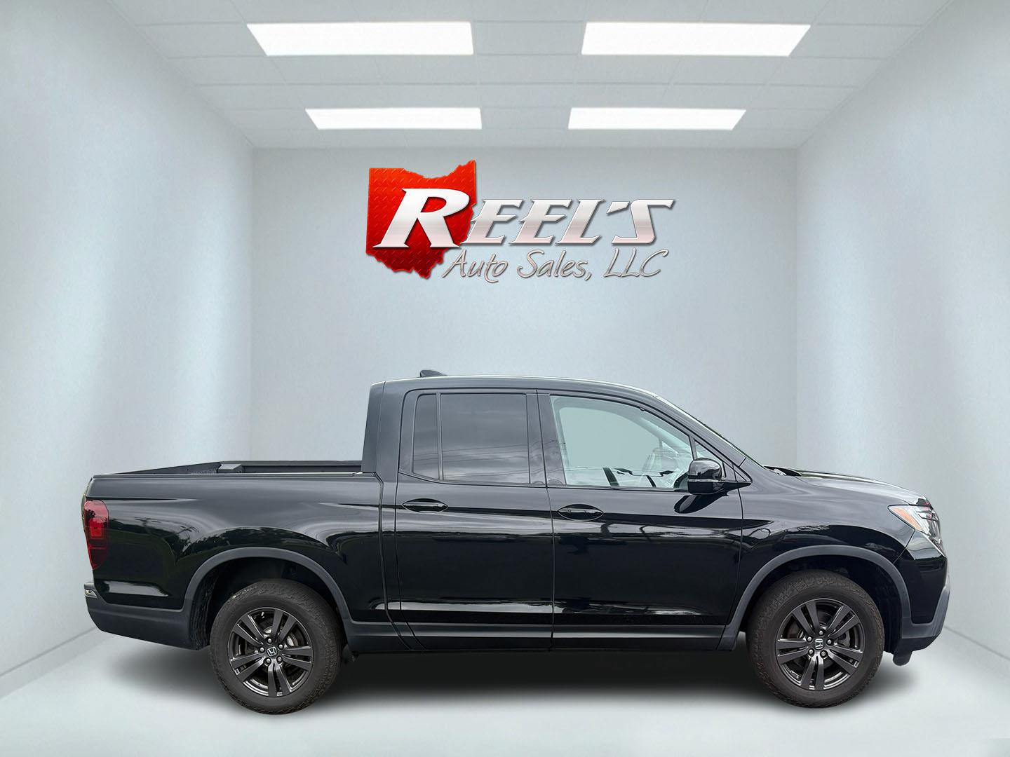 2019 Black /Black Honda Ridgeline Sport AWD (5FPYK3F10KB) with an 3.5L V6 SOHC 24V engine, 6 Speed Auto transmission, located at 11115 Chardon Rd. , Chardon, OH, 44024, (440) 214-9705, 41.580246, -81.241943 - This 2019 Honda Ridgeline Sport AWD is equipped with a 3.5-liter EarthDreams V6 engine and a 6-speed automatic transmission, offering a blend of power and efficiency. It features convenient daytime running lights and dusk-sensing headlights for enhanced visibility. Inside, this Ridgeline provides a - Photo#12