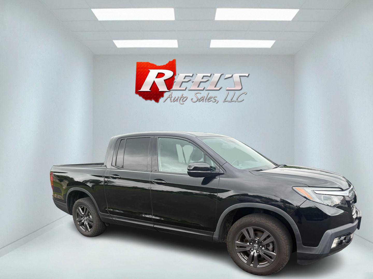 2019 Black /Black Honda Ridgeline Sport AWD (5FPYK3F10KB) with an 3.5L V6 SOHC 24V engine, 6 Speed Auto transmission, located at 11115 Chardon Rd. , Chardon, OH, 44024, (440) 214-9705, 41.580246, -81.241943 - This 2019 Honda Ridgeline Sport AWD is equipped with a 3.5-liter EarthDreams V6 engine and a 6-speed automatic transmission, offering a blend of power and efficiency. It features convenient daytime running lights and dusk-sensing headlights for enhanced visibility. Inside, this Ridgeline provides a - Photo#11