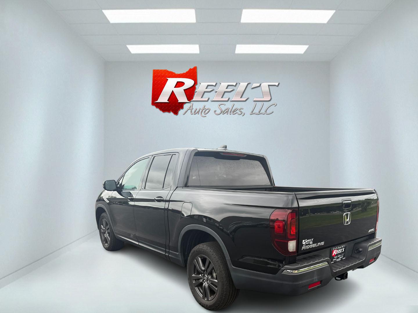 2019 Black /Black Honda Ridgeline Sport AWD (5FPYK3F10KB) with an 3.5L V6 SOHC 24V engine, 6 Speed Auto transmission, located at 11115 Chardon Rd. , Chardon, OH, 44024, (440) 214-9705, 41.580246, -81.241943 - This 2019 Honda Ridgeline Sport AWD is equipped with a 3.5-liter EarthDreams V6 engine and a 6-speed automatic transmission, offering a blend of power and efficiency. It features convenient daytime running lights and dusk-sensing headlights for enhanced visibility. Inside, this Ridgeline provides a - Photo#34