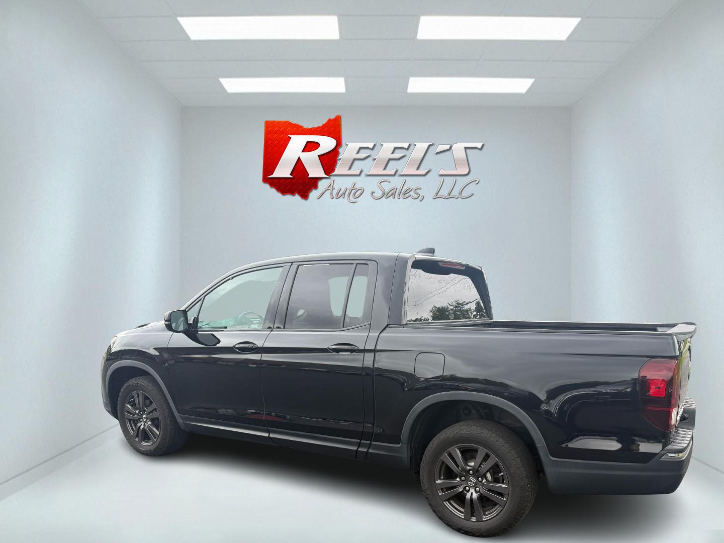2019 Black /Black Honda Ridgeline Sport AWD (5FPYK3F10KB) with an 3.5L V6 SOHC 24V engine, 6 Speed Auto transmission, located at 11115 Chardon Rd. , Chardon, OH, 44024, (440) 214-9705, 41.580246, -81.241943 - This 2019 Honda Ridgeline Sport AWD is equipped with a 3.5-liter EarthDreams V6 engine and a 6-speed automatic transmission, offering a blend of power and efficiency. It features convenient daytime running lights and dusk-sensing headlights for enhanced visibility. Inside, this Ridgeline provides a - Photo#35