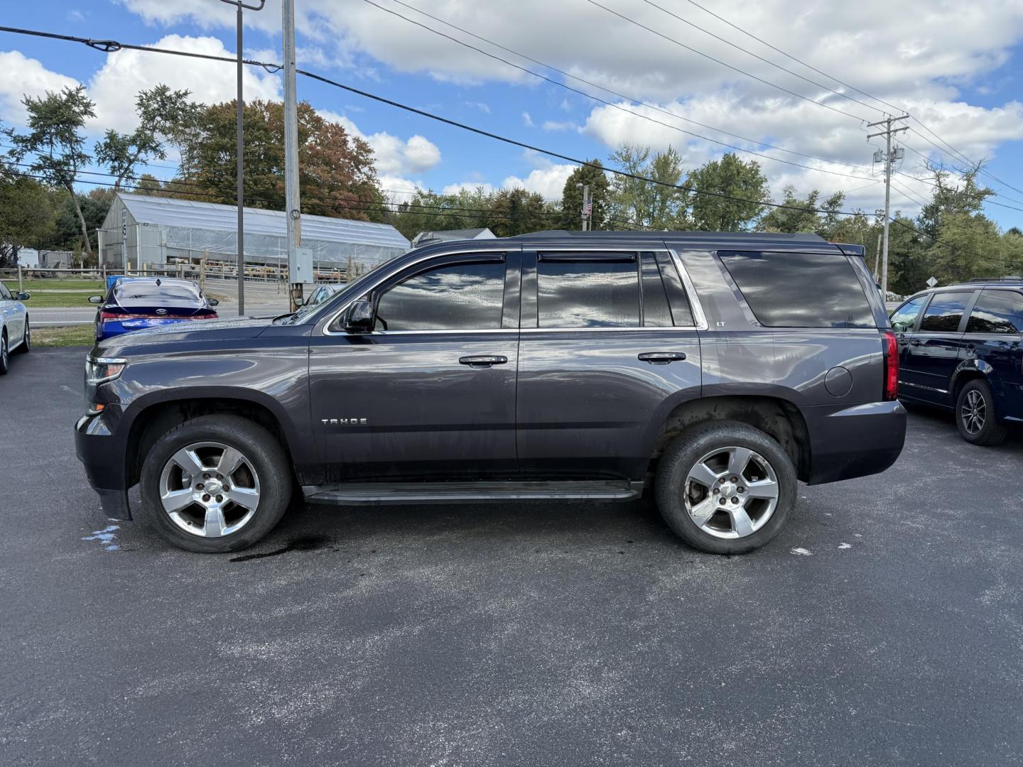 2017 Gray /Black Chevrolet Tahoe LT 4WD (1GNSKBKC4HR) with an 5.3L V8 OHV 16V engine, 6A transmission, located at 11115 Chardon Rd. , Chardon, OH, 44024, (440) 214-9705, 41.580246, -81.241943 - Command the road with this 2017 Chevrolet Tahoe LT 4WD, powered by a robust 5.3L V8 EcoTec3 engine and 6-speed automatic transmission, offering a 6,200-pound towing capacity for all your adventures. The luxurious leather interior features heated front and rear seats, tri-zone automatic climate contr - Photo#11