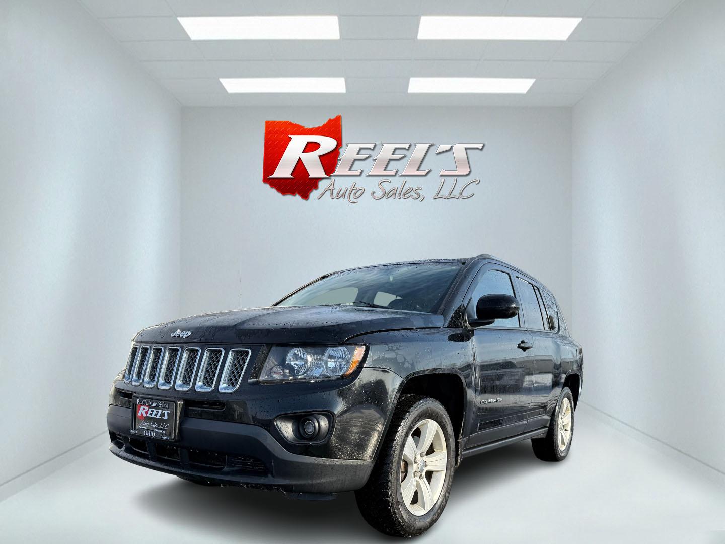 2014 Black /Black Jeep Compass Latitude FWD (1C4NJCEB7ED) with an 2.4L I4 DOHC 16V engine, Automatic transmission, located at 547 E. Main St., Orwell, OH, 44076, (440) 437-5893, 41.535435, -80.847855 - Photo#0