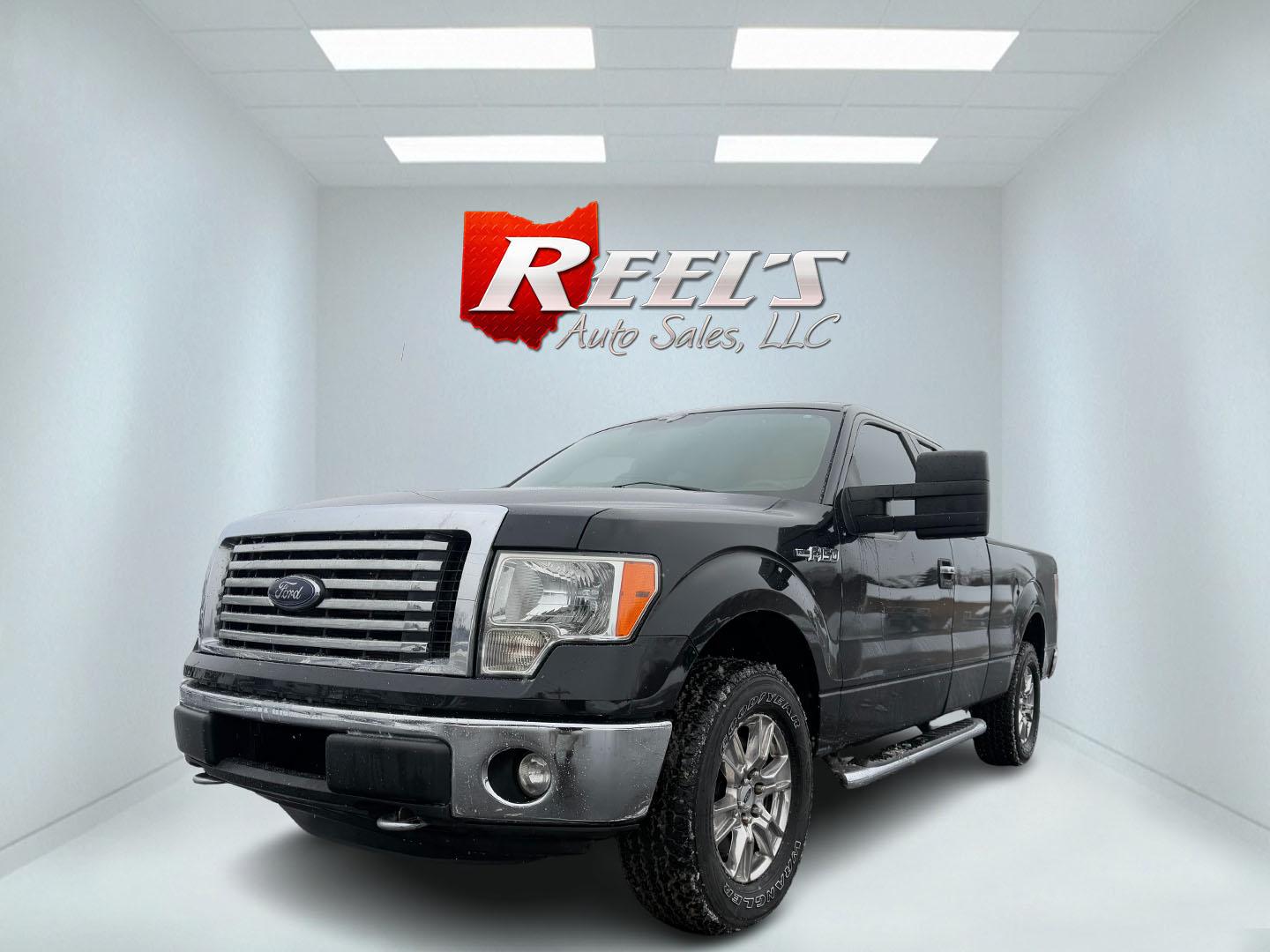 2012 Black /Tan Ford F-150 XLT SuperCab 6.5-ft. Bed 4WD (1FTFX1EF1CF) with an 5.0L V8 FFV engine, 6-Speed Automatic transmission, located at 11115 Chardon Rd. , Chardon, OH, 44024, (440) 214-9705, 41.580246, -81.241943 - Photo#0