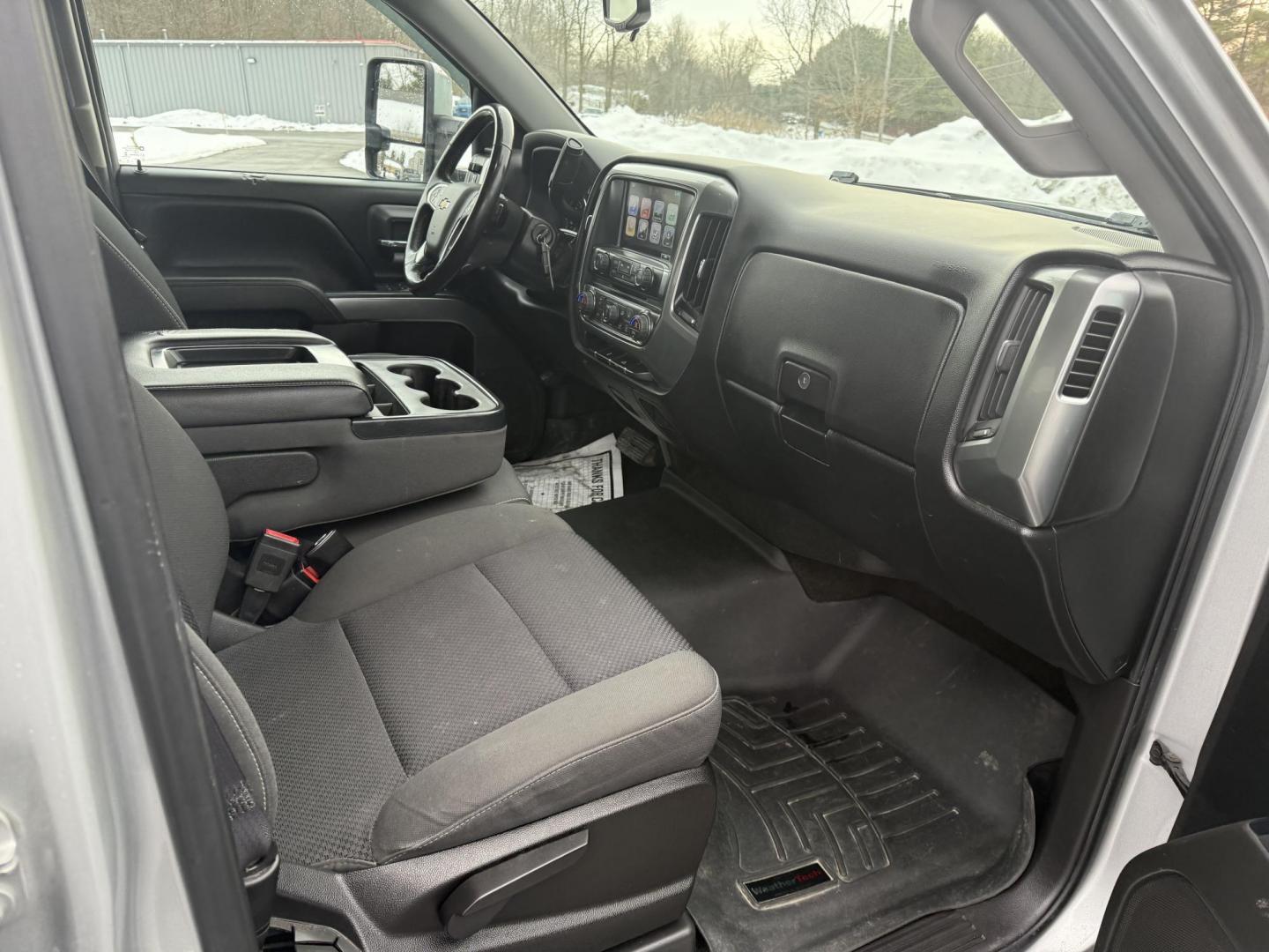 2017 Silver /Black Chevrolet Silverado 1500 LT Crew Cab 4WD (3GCUKREC6HG) with an 5.3L V8 OHV 16V engine, 6A transmission, located at 547 E. Main St., Orwell, OH, 44076, (440) 437-5893, 41.535435, -80.847855 - This 2017 Chevrolet Silverado 1500 LT Crew Cab 4WD is a versatile and robust pickup, powered by a 5.3-liter Vortec V8 engine mated with a 6-speed automatic transmission. This configuration delivers both strong performance and dependable towing capabilities, with a capacity of up to 9,400 pounds. Ins - Photo#36