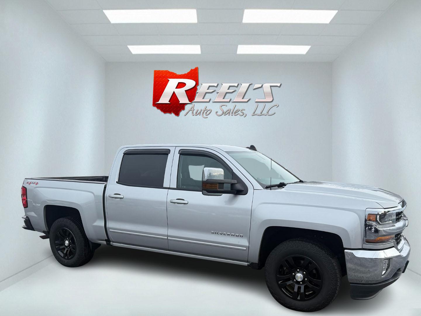 2017 Silver /Black Chevrolet Silverado 1500 LT Crew Cab 4WD (3GCUKREC6HG) with an 5.3L V8 OHV 16V engine, 6A transmission, located at 547 E. Main St., Orwell, OH, 44076, (440) 437-5893, 41.535435, -80.847855 - This 2017 Chevrolet Silverado 1500 LT Crew Cab 4WD is a versatile and robust pickup, powered by a 5.3-liter Vortec V8 engine mated with a 6-speed automatic transmission. This configuration delivers both strong performance and dependable towing capabilities, with a capacity of up to 9,400 pounds. Ins - Photo#16