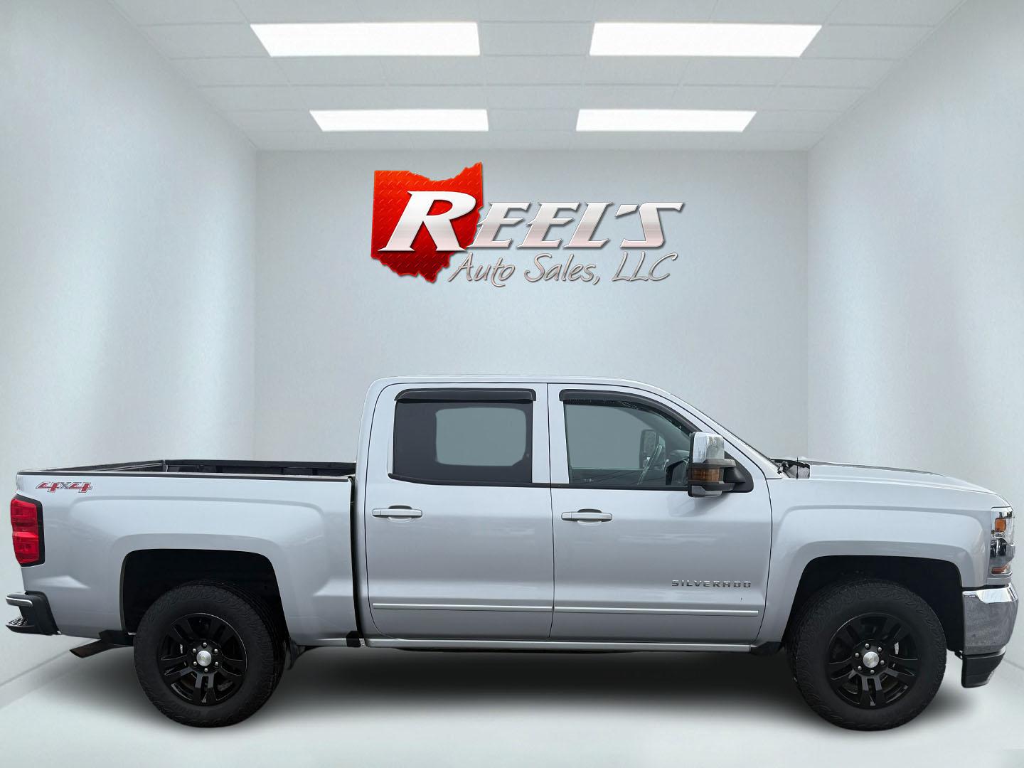 2017 Silver /Black Chevrolet Silverado 1500 LT Crew Cab 4WD (3GCUKREC6HG) with an 5.3L V8 OHV 16V engine, 6A transmission, located at 547 E. Main St., Orwell, OH, 44076, (440) 437-5893, 41.535435, -80.847855 - This 2017 Chevrolet Silverado 1500 LT Crew Cab 4WD is a versatile and robust pickup, powered by a 5.3-liter Vortec V8 engine mated with a 6-speed automatic transmission. This configuration delivers both strong performance and dependable towing capabilities, with a capacity of up to 9,400 pounds. Ins - Photo#17