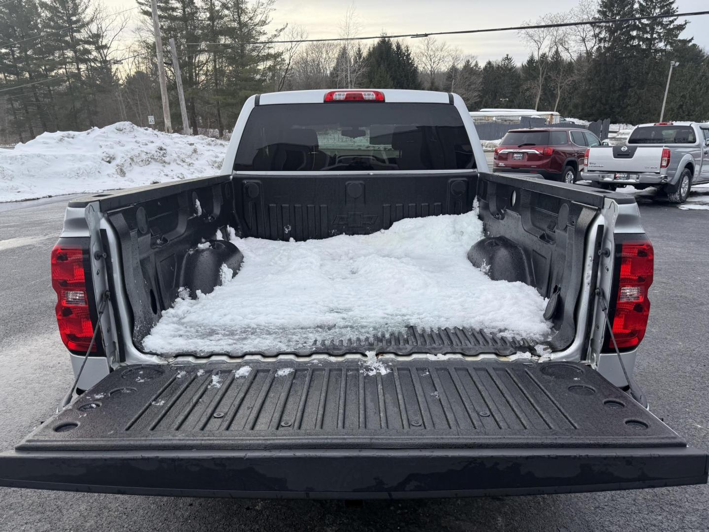 2017 Silver /Black Chevrolet Silverado 1500 LT Crew Cab 4WD (3GCUKREC6HG) with an 5.3L V8 OHV 16V engine, 6A transmission, located at 547 E. Main St., Orwell, OH, 44076, (440) 437-5893, 41.535435, -80.847855 - This 2017 Chevrolet Silverado 1500 LT Crew Cab 4WD is a versatile and robust pickup, powered by a 5.3-liter Vortec V8 engine mated with a 6-speed automatic transmission. This configuration delivers both strong performance and dependable towing capabilities, with a capacity of up to 9,400 pounds. Ins - Photo#25