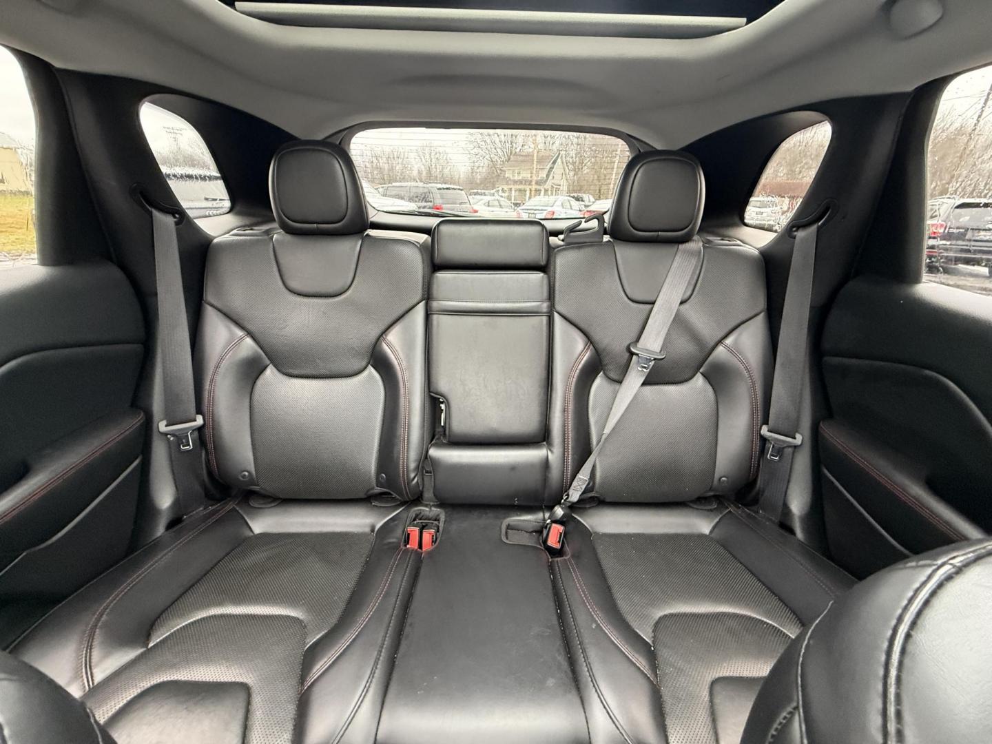 2019 Red /Black Jeep Cherokee Trailhawk Elite 4WD (1C4PJMBX3KD) with an 3.2L V6 DOHC 24V engine, 9A transmission, located at 11115 Chardon Rd. , Chardon, OH, 44024, (440) 214-9705, 41.580246, -81.241943 - This 2019 Jeep Cherokee Trailhawk Elite is a comfortable and capable off-road SUV. It is powered by a 3.2-liter V6 engine and mated to a 9-speed automatic transmission for a smooth drive output. The interior is luxurious with leather upholstery, heated and cooled front seats, power-adjustable seats - Photo#16
