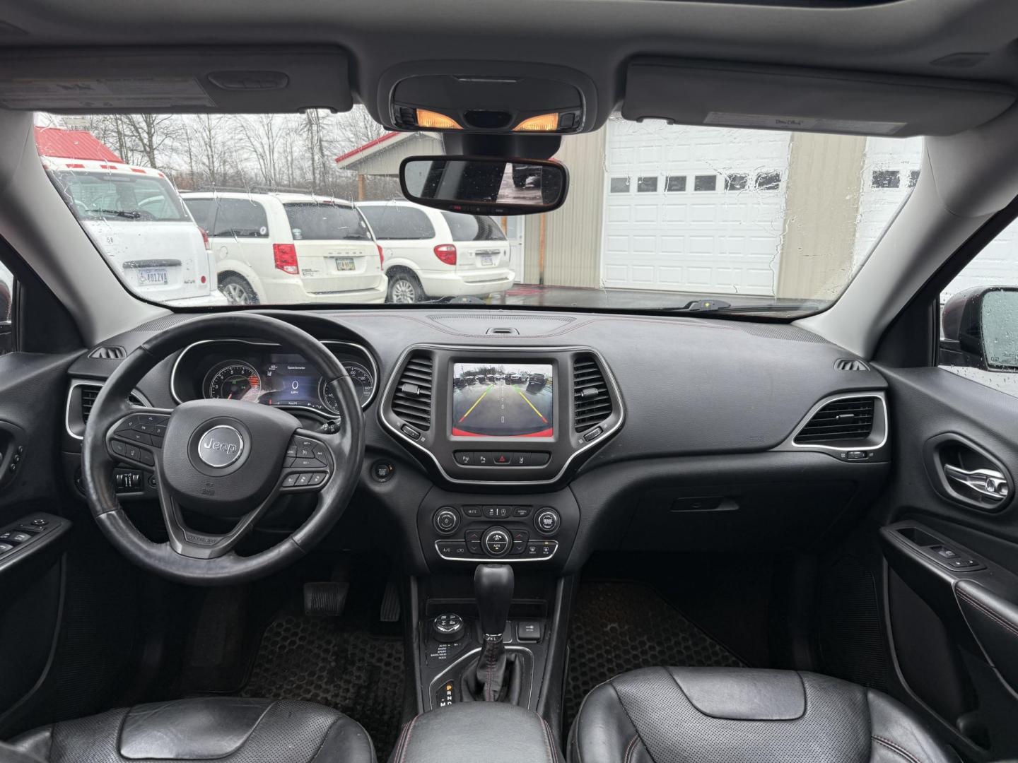 2019 Red /Black Jeep Cherokee Trailhawk Elite 4WD (1C4PJMBX3KD) with an 3.2L V6 DOHC 24V engine, 9A transmission, located at 11115 Chardon Rd. , Chardon, OH, 44024, (440) 214-9705, 41.580246, -81.241943 - This 2019 Jeep Cherokee Trailhawk Elite is a comfortable and capable off-road SUV. It is powered by a 3.2-liter V6 engine and mated to a 9-speed automatic transmission for a smooth drive output. The interior is luxurious with leather upholstery, heated and cooled front seats, power-adjustable seats - Photo#17