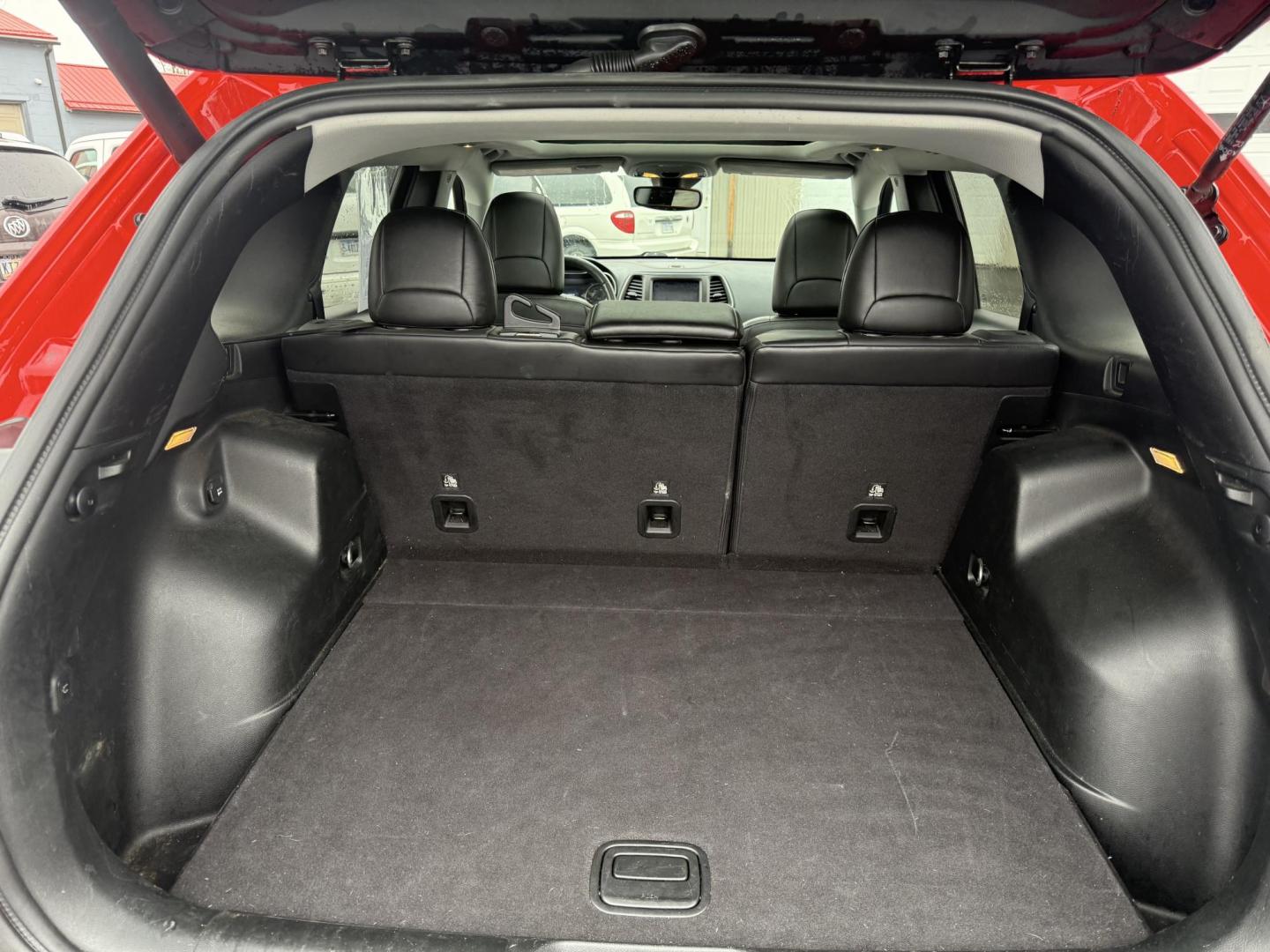 2019 Red /Black Jeep Cherokee Trailhawk Elite 4WD (1C4PJMBX3KD) with an 3.2L V6 DOHC 24V engine, 9A transmission, located at 11115 Chardon Rd. , Chardon, OH, 44024, (440) 214-9705, 41.580246, -81.241943 - This 2019 Jeep Cherokee Trailhawk Elite is a comfortable and capable off-road SUV. It is powered by a 3.2-liter V6 engine and mated to a 9-speed automatic transmission for a smooth drive output. The interior is luxurious with leather upholstery, heated and cooled front seats, power-adjustable seats - Photo#18