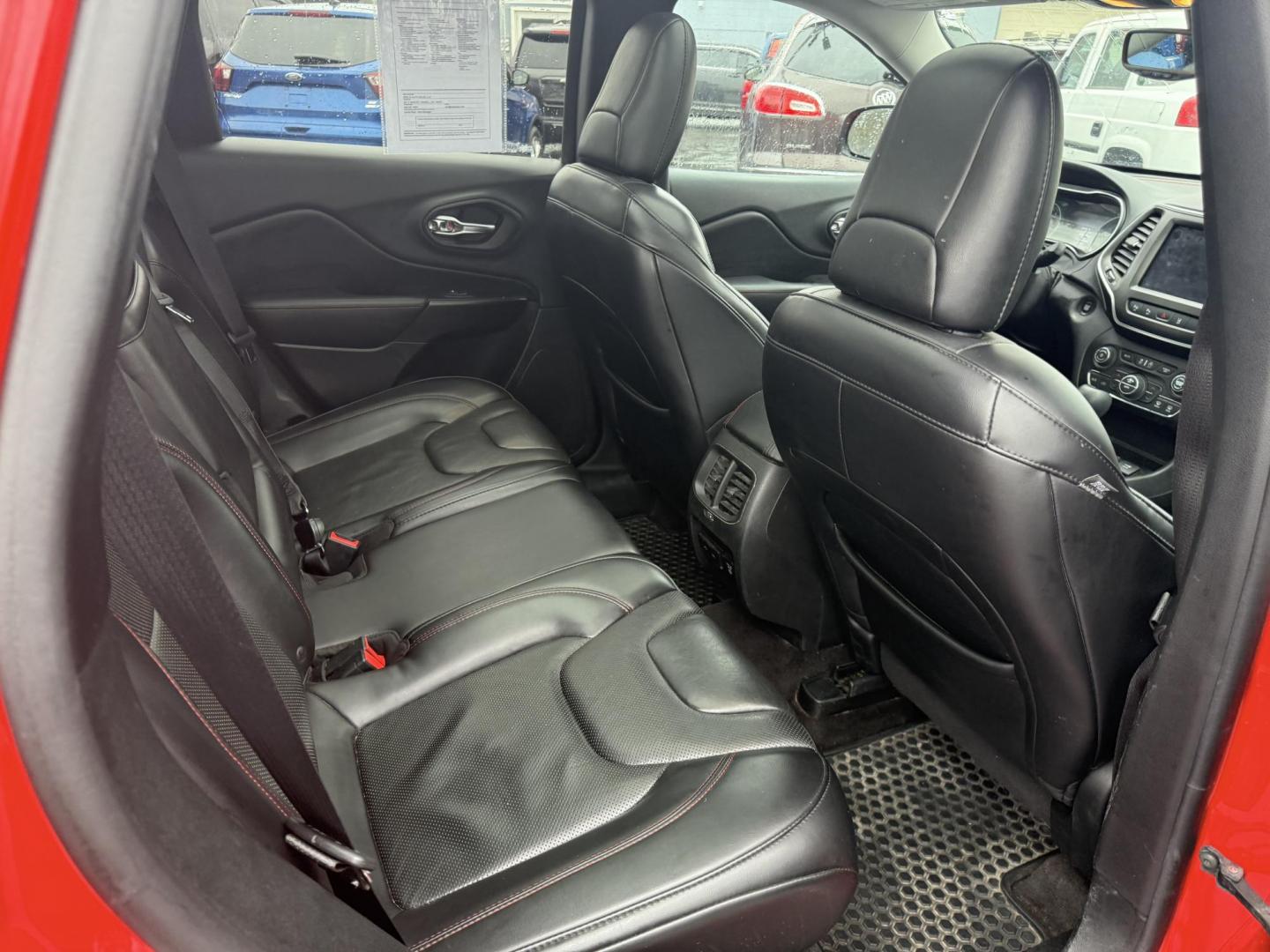 2019 Red /Black Jeep Cherokee Trailhawk Elite 4WD (1C4PJMBX3KD) with an 3.2L V6 DOHC 24V engine, 9A transmission, located at 11115 Chardon Rd. , Chardon, OH, 44024, (440) 214-9705, 41.580246, -81.241943 - This 2019 Jeep Cherokee Trailhawk Elite is a comfortable and capable off-road SUV. It is powered by a 3.2-liter V6 engine and mated to a 9-speed automatic transmission for a smooth drive output. The interior is luxurious with leather upholstery, heated and cooled front seats, power-adjustable seats - Photo#35