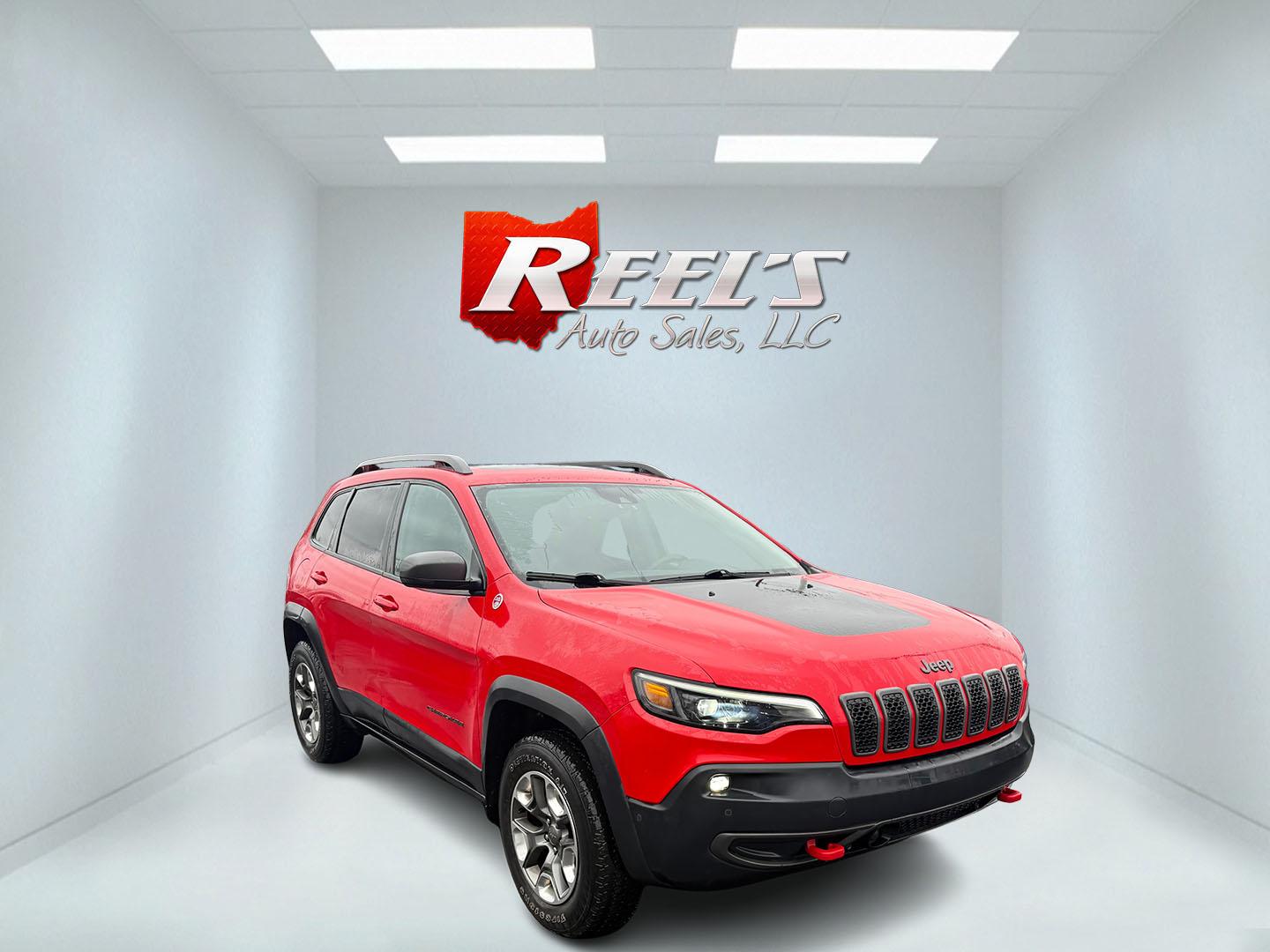 2019 Red /Black Jeep Cherokee Trailhawk Elite 4WD (1C4PJMBX3KD) with an 3.2L V6 DOHC 24V engine, 9A transmission, located at 11115 Chardon Rd. , Chardon, OH, 44024, (440) 214-9705, 41.580246, -81.241943 - This 2019 Jeep Cherokee Trailhawk Elite is a comfortable and capable off-road SUV. It is powered by a 3.2-liter V6 engine and mated to a 9-speed automatic transmission for a smooth drive output. The interior is luxurious with leather upholstery, heated and cooled front seats, power-adjustable seats - Photo#2