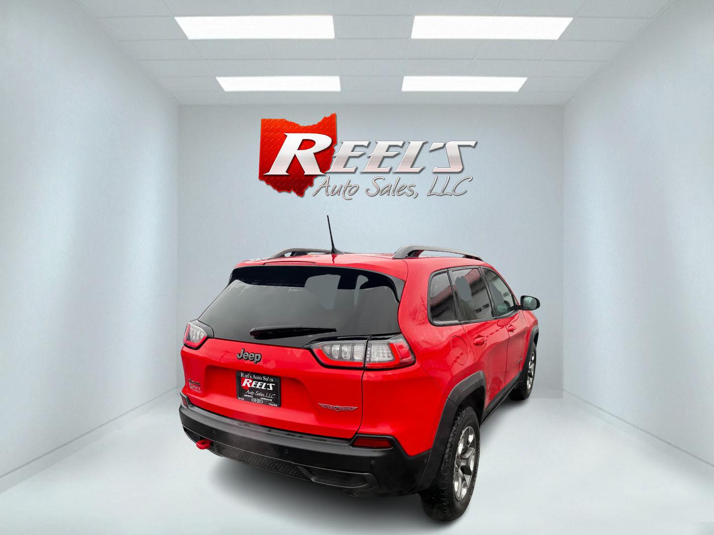 2019 Red /Black Jeep Cherokee Trailhawk Elite 4WD (1C4PJMBX3KD) with an 3.2L V6 DOHC 24V engine, 9A transmission, located at 11115 Chardon Rd. , Chardon, OH, 44024, (440) 214-9705, 41.580246, -81.241943 - This 2019 Jeep Cherokee Trailhawk Elite is a comfortable and capable off-road SUV. It is powered by a 3.2-liter V6 engine and mated to a 9-speed automatic transmission for a smooth drive output. The interior is luxurious with leather upholstery, heated and cooled front seats, power-adjustable seats - Photo#25