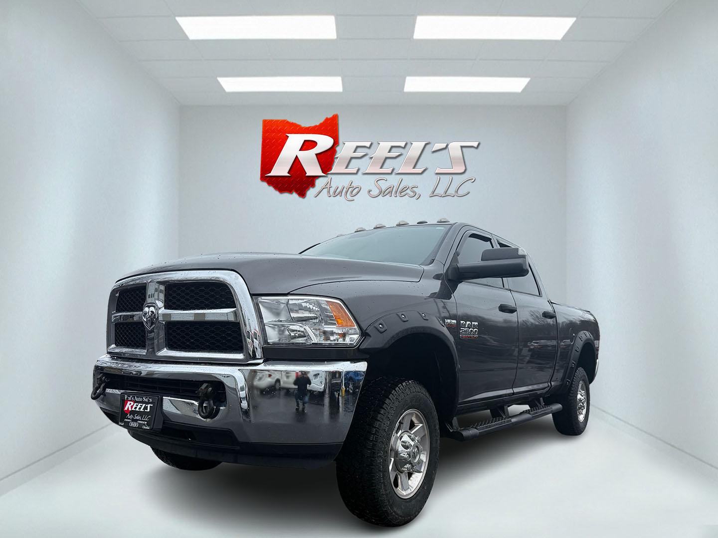 2018 Gray /Black RAM 2500 Tradesman Crew Cab SWB 4WD (3C6UR5CJ2JG) with an 6.4L V8 engine, 6A transmission, located at 547 E. Main St., Orwell, OH, 44076, (440) 437-5893, 41.535435, -80.847855 - This 2018 Ram 2500 Tradesman Crew Cab 4WD is a powerful and practical truck intended for heavy duty tasks and is powered by a 6.4-liter HEMI V8 engine for robust performance. It has a 6-speed automatic transmission, which is very manageable and also has a strong towing capacity of up to 12,630 pound - Photo#0