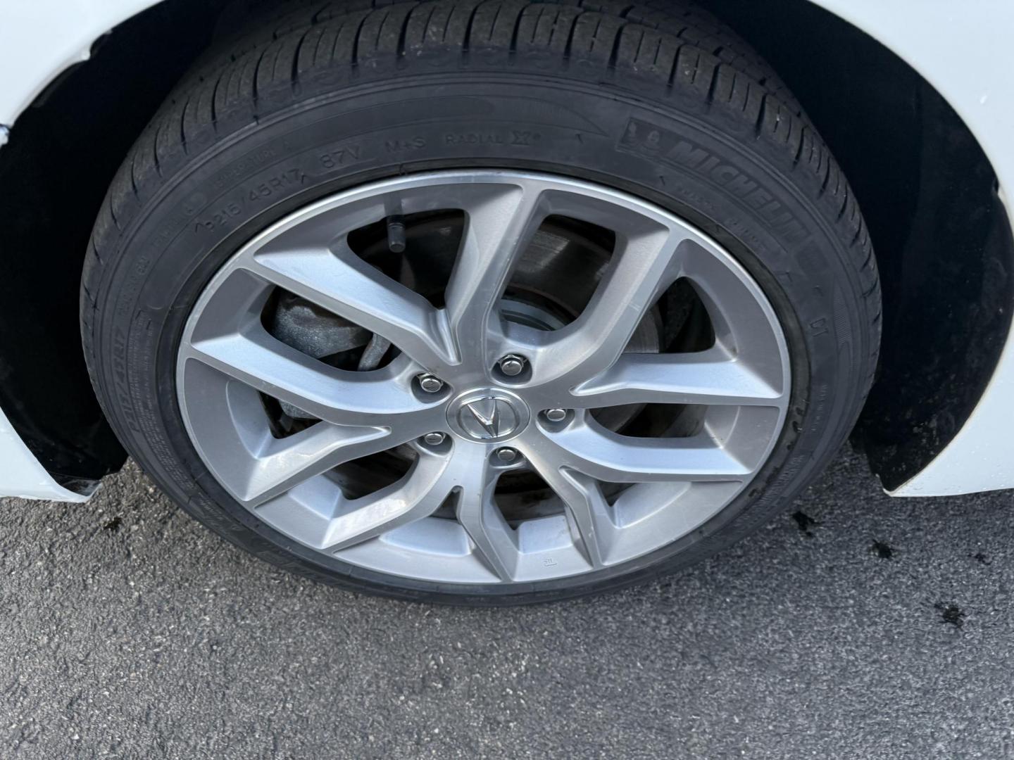 2021 White /Black Acura ILX Base (19UDE2F36MA) with an 2.0L I4 16V DOHC engine, 8A transmission, located at 547 E. Main St., Orwell, OH, 44076, (440) 437-5893, 41.535435, -80.847855 - This 2021 Acura ILX, equipped with a 2.4-liter Earthdreams I4 engine and an 8-speed automatic transmission, delivers a refined driving experience with efficient performance, achieving up to 34 MPG on the highway. The leather interior with heated front seats offers a touch of luxury, while features l - Photo#21