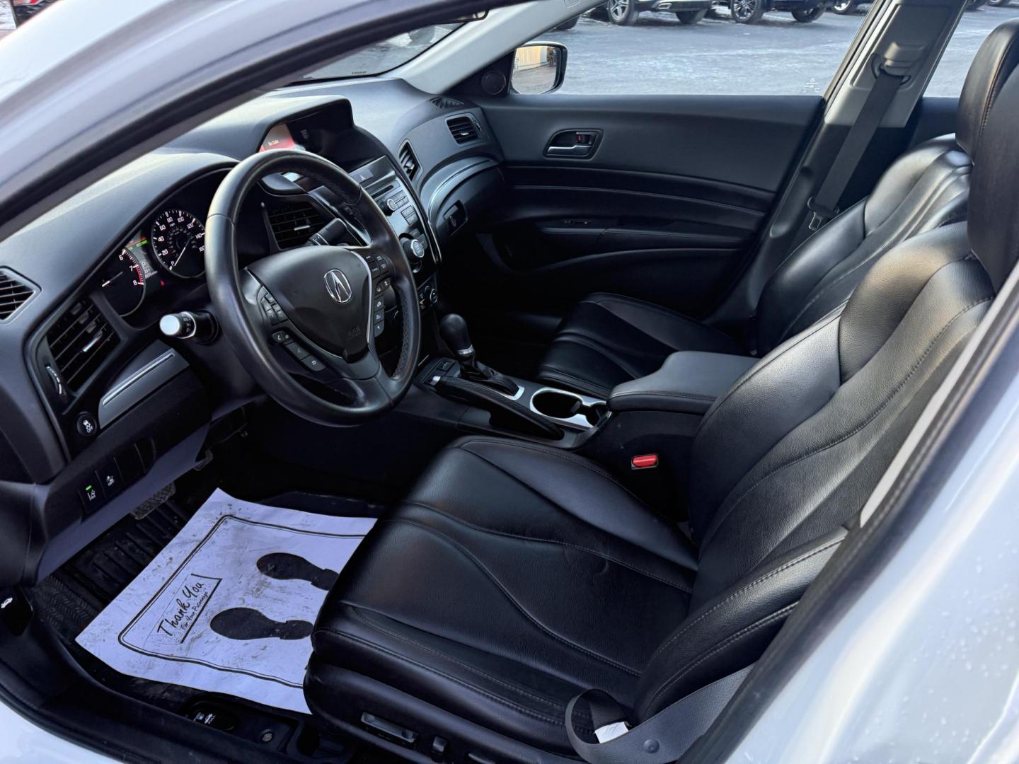 2021 White /Black Acura ILX Base (19UDE2F36MA) with an 2.0L I4 16V DOHC engine, 8A transmission, located at 547 E. Main St., Orwell, OH, 44076, (440) 437-5893, 41.535435, -80.847855 - This 2021 Acura ILX, equipped with a 2.4-liter Earthdreams I4 engine and an 8-speed automatic transmission, delivers a refined driving experience with efficient performance, achieving up to 34 MPG on the highway. The leather interior with heated front seats offers a touch of luxury, while features l - Photo#3