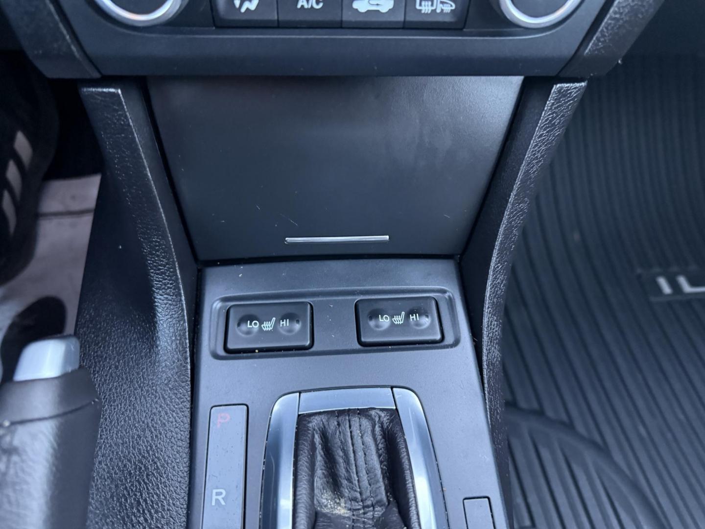 2021 White /Black Acura ILX Base (19UDE2F36MA) with an 2.0L I4 16V DOHC engine, 8A transmission, located at 547 E. Main St., Orwell, OH, 44076, (440) 437-5893, 41.535435, -80.847855 - This 2021 Acura ILX, equipped with a 2.4-liter Earthdreams I4 engine and an 8-speed automatic transmission, delivers a refined driving experience with efficient performance, achieving up to 34 MPG on the highway. The leather interior with heated front seats offers a touch of luxury, while features l - Photo#26
