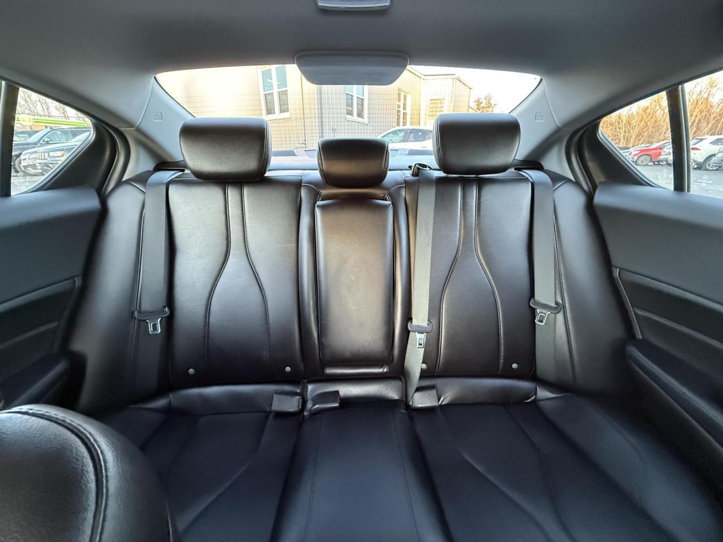 2021 White /Black Acura ILX Base (19UDE2F36MA) with an 2.0L I4 16V DOHC engine, 8A transmission, located at 547 E. Main St., Orwell, OH, 44076, (440) 437-5893, 41.535435, -80.847855 - This 2021 Acura ILX, equipped with a 2.4-liter Earthdreams I4 engine and an 8-speed automatic transmission, delivers a refined driving experience with efficient performance, achieving up to 34 MPG on the highway. The leather interior with heated front seats offers a touch of luxury, while features l - Photo#30