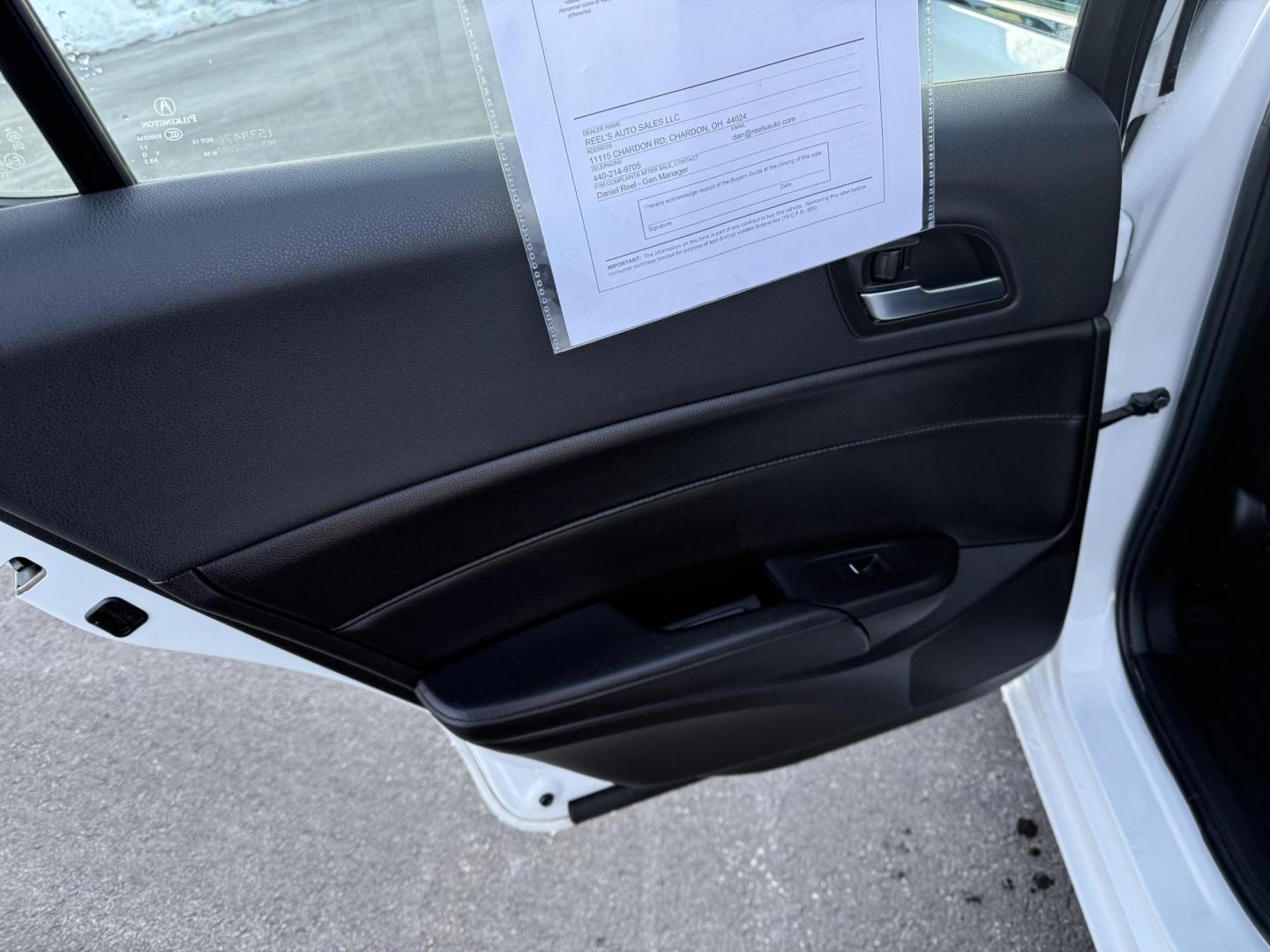 2021 White /Black Acura ILX Base (19UDE2F36MA) with an 2.0L I4 16V DOHC engine, 8A transmission, located at 547 E. Main St., Orwell, OH, 44076, (440) 437-5893, 41.535435, -80.847855 - This 2021 Acura ILX, equipped with a 2.4-liter Earthdreams I4 engine and an 8-speed automatic transmission, delivers a refined driving experience with efficient performance, achieving up to 34 MPG on the highway. The leather interior with heated front seats offers a touch of luxury, while features l - Photo#32