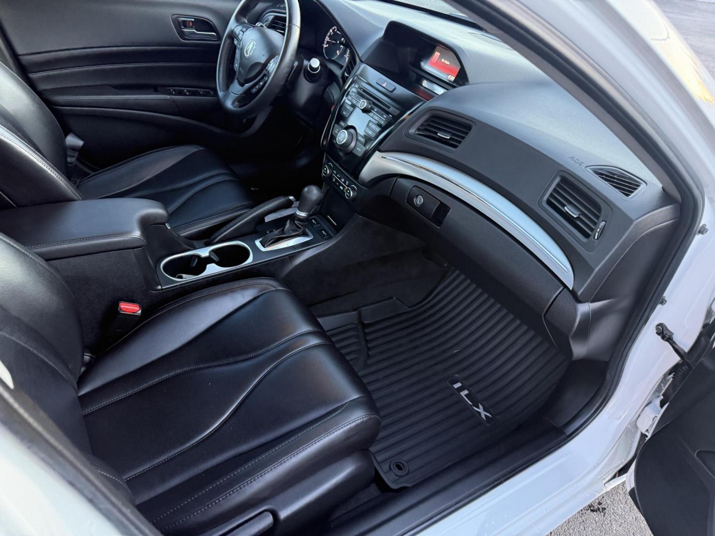 2021 White /Black Acura ILX Base (19UDE2F36MA) with an 2.0L I4 16V DOHC engine, 8A transmission, located at 547 E. Main St., Orwell, OH, 44076, (440) 437-5893, 41.535435, -80.847855 - This 2021 Acura ILX, equipped with a 2.4-liter Earthdreams I4 engine and an 8-speed automatic transmission, delivers a refined driving experience with efficient performance, achieving up to 34 MPG on the highway. The leather interior with heated front seats offers a touch of luxury, while features l - Photo#38