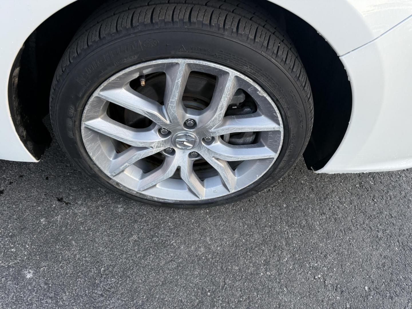 2021 White /Black Acura ILX Base (19UDE2F36MA) with an 2.0L I4 16V DOHC engine, 8A transmission, located at 547 E. Main St., Orwell, OH, 44076, (440) 437-5893, 41.535435, -80.847855 - This 2021 Acura ILX, equipped with a 2.4-liter Earthdreams I4 engine and an 8-speed automatic transmission, delivers a refined driving experience with efficient performance, achieving up to 34 MPG on the highway. The leather interior with heated front seats offers a touch of luxury, while features l - Photo#18