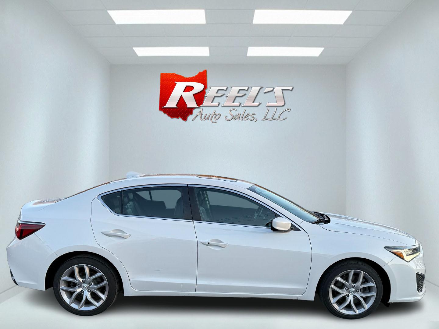 2021 White /Black Acura ILX Base (19UDE2F36MA) with an 2.0L I4 16V DOHC engine, 8A transmission, located at 547 E. Main St., Orwell, OH, 44076, (440) 437-5893, 41.535435, -80.847855 - This 2021 Acura ILX, equipped with a 2.4-liter Earthdreams I4 engine and an 8-speed automatic transmission, delivers a refined driving experience with efficient performance, achieving up to 34 MPG on the highway. The leather interior with heated front seats offers a touch of luxury, while features l - Photo#12