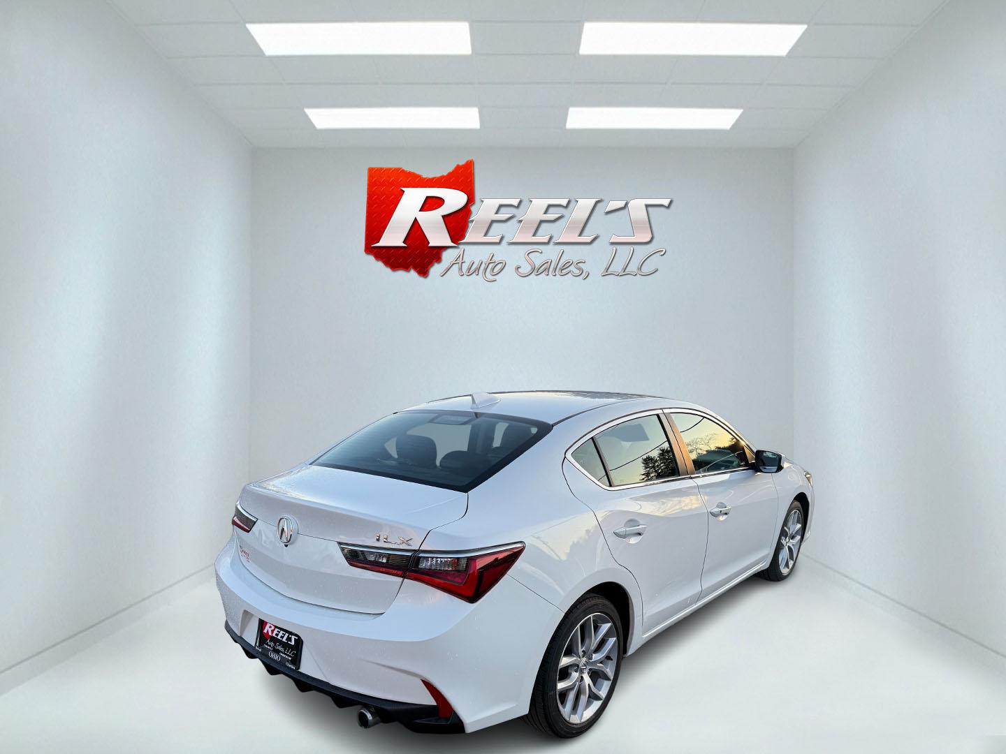 2021 White /Black Acura ILX Base (19UDE2F36MA) with an 2.0L I4 16V DOHC engine, 8A transmission, located at 547 E. Main St., Orwell, OH, 44076, (440) 437-5893, 41.535435, -80.847855 - This 2021 Acura ILX, equipped with a 2.4-liter Earthdreams I4 engine and an 8-speed automatic transmission, delivers a refined driving experience with efficient performance, achieving up to 34 MPG on the highway. The leather interior with heated front seats offers a touch of luxury, while features l - Photo#13