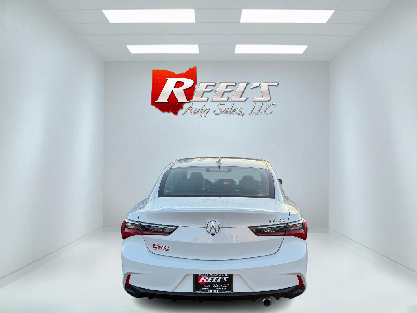 2021 White /Black Acura ILX Base (19UDE2F36MA) with an 2.0L I4 16V DOHC engine, 8A transmission, located at 547 E. Main St., Orwell, OH, 44076, (440) 437-5893, 41.535435, -80.847855 - This 2021 Acura ILX, equipped with a 2.4-liter Earthdreams I4 engine and an 8-speed automatic transmission, delivers a refined driving experience with efficient performance, achieving up to 34 MPG on the highway. The leather interior with heated front seats offers a touch of luxury, while features l - Photo#14