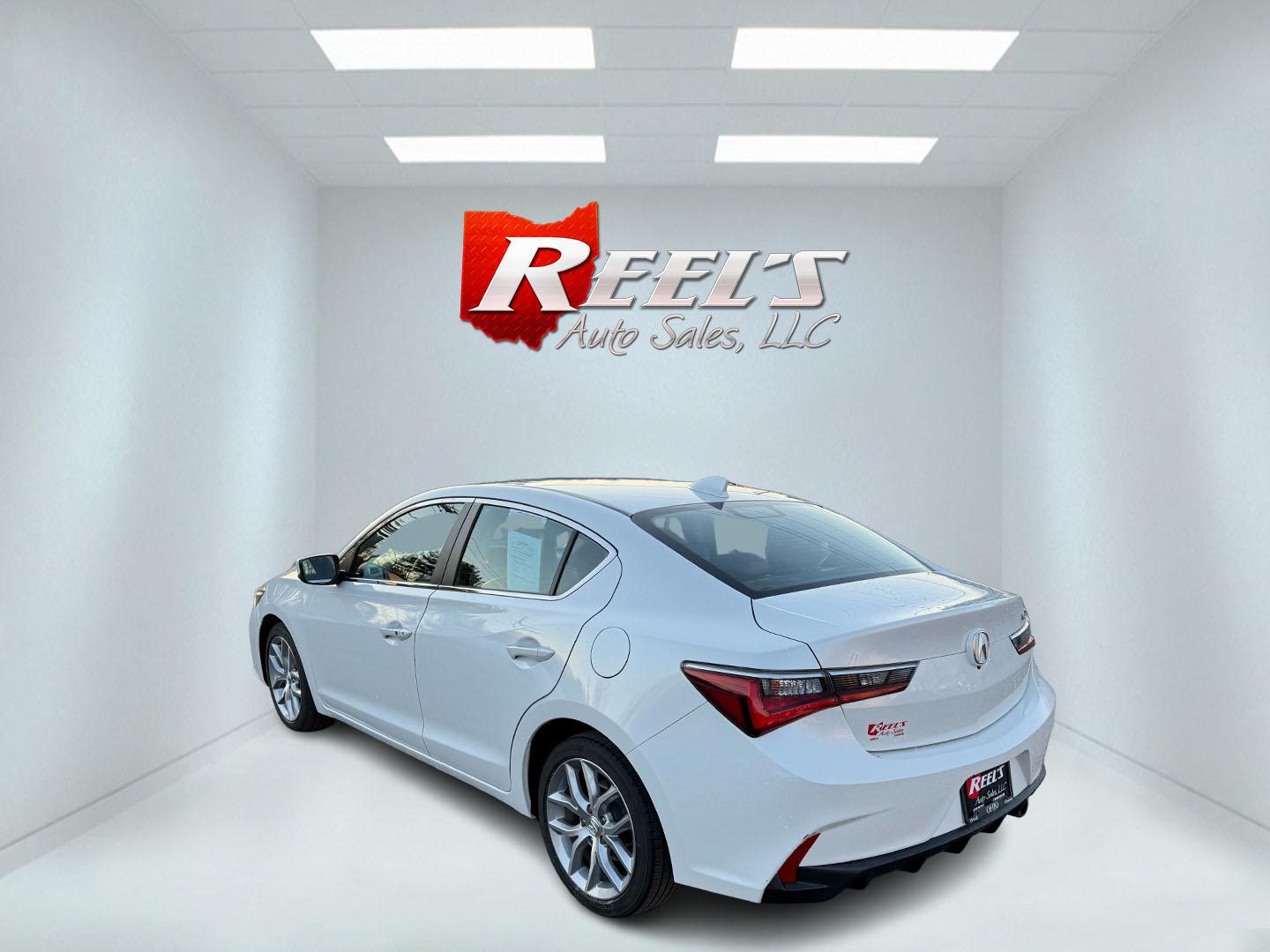 2021 White /Black Acura ILX Base (19UDE2F36MA) with an 2.0L I4 16V DOHC engine, 8A transmission, located at 547 E. Main St., Orwell, OH, 44076, (440) 437-5893, 41.535435, -80.847855 - This 2021 Acura ILX, equipped with a 2.4-liter Earthdreams I4 engine and an 8-speed automatic transmission, delivers a refined driving experience with efficient performance, achieving up to 34 MPG on the highway. The leather interior with heated front seats offers a touch of luxury, while features l - Photo#15