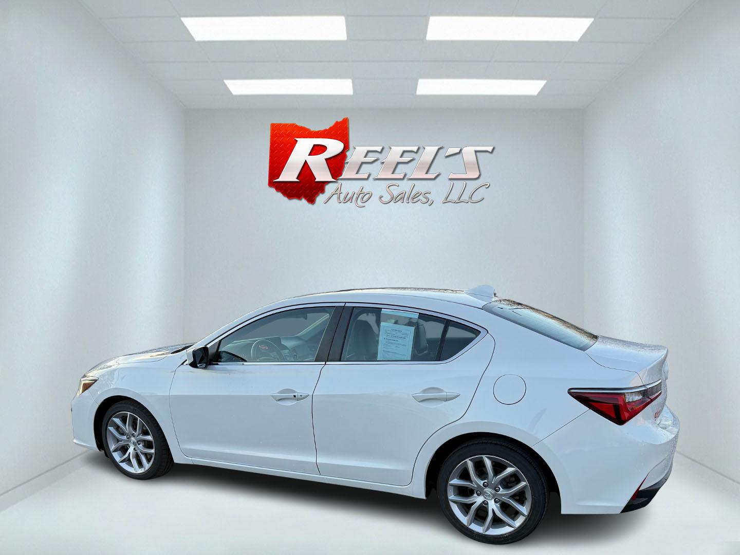 2021 White /Black Acura ILX Base (19UDE2F36MA) with an 2.0L I4 16V DOHC engine, 8A transmission, located at 547 E. Main St., Orwell, OH, 44076, (440) 437-5893, 41.535435, -80.847855 - This 2021 Acura ILX, equipped with a 2.4-liter Earthdreams I4 engine and an 8-speed automatic transmission, delivers a refined driving experience with efficient performance, achieving up to 34 MPG on the highway. The leather interior with heated front seats offers a touch of luxury, while features l - Photo#16