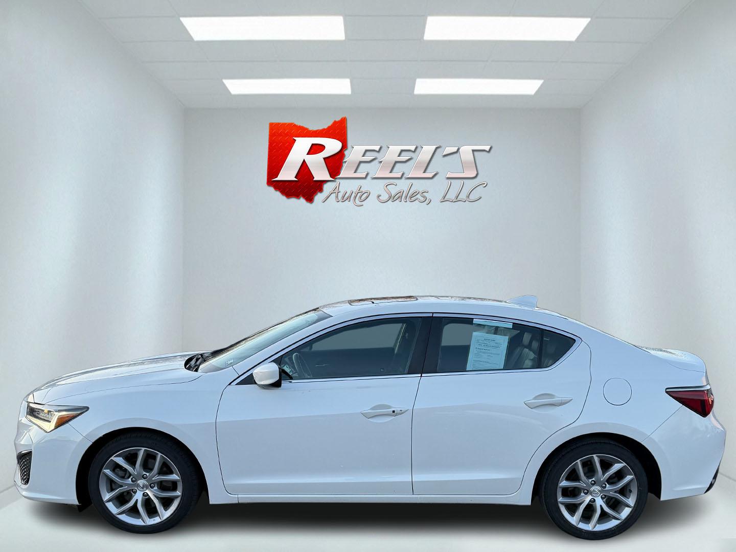 2021 White /Black Acura ILX Base (19UDE2F36MA) with an 2.0L I4 16V DOHC engine, 8A transmission, located at 547 E. Main St., Orwell, OH, 44076, (440) 437-5893, 41.535435, -80.847855 - This 2021 Acura ILX, equipped with a 2.4-liter Earthdreams I4 engine and an 8-speed automatic transmission, delivers a refined driving experience with efficient performance, achieving up to 34 MPG on the highway. The leather interior with heated front seats offers a touch of luxury, while features l - Photo#17