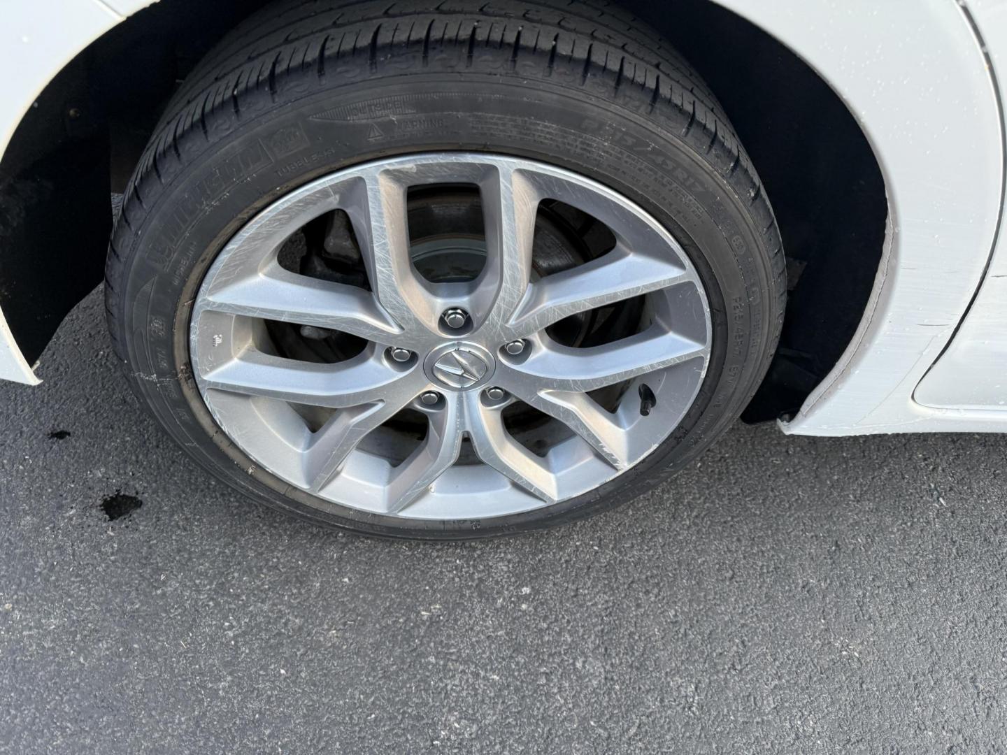 2021 White /Black Acura ILX Base (19UDE2F36MA) with an 2.0L I4 16V DOHC engine, 8A transmission, located at 547 E. Main St., Orwell, OH, 44076, (440) 437-5893, 41.535435, -80.847855 - This 2021 Acura ILX, equipped with a 2.4-liter Earthdreams I4 engine and an 8-speed automatic transmission, delivers a refined driving experience with efficient performance, achieving up to 34 MPG on the highway. The leather interior with heated front seats offers a touch of luxury, while features l - Photo#19